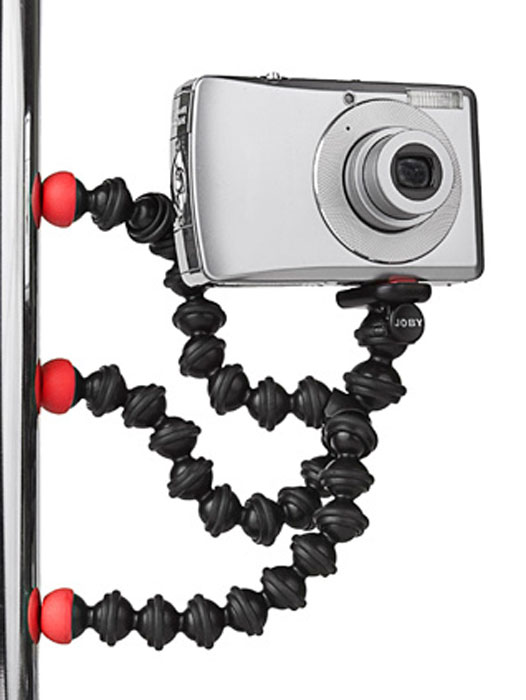 Joby Gorillapod Magnetic, Black Red штативJB00151-CM6 Joby Gorillapod Magnetic, Black Red штативJB00151-CM6Штатив Gorillapod Video позволит снять на фото и видео яркие моменты. Теперь снимать качественно можно используя минивидеокамеру, мобильный телефон или компактную фотокамеру с возможностью видеосъемки. Гибкие шарнирные ножки помогут закрепить штатив где и на чем угодно, а магнитные ножки позволят прикрепить его к любой любой металлической поверхности. В результате снимать видео можно под любым углом и в самом необычном ракурсе.
