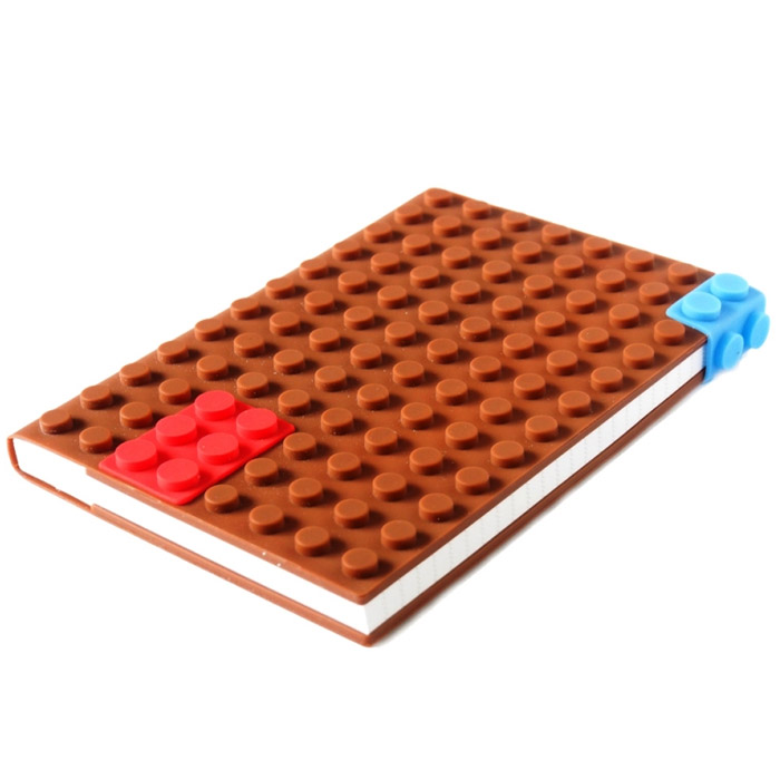 Блокнот Lego, цвет: коричневый, 14 см х 21 см. 002913002913 Блокнот Lego, цвет: коричневый, 14 см х 21 см. 002913002913Оригинальный блокнот Lego идеально подойдет для памятных записей, любимых стихов, рисунков и многого другого. Обложка блокнота выполнена из мягкого силикона и по дизайну напоминает элементы конструктора Lego.Внутри блокнот содержит блок для записей с разлинованными листами.Блокнот станет забавным и практичным подарком - он не затеряется среди бумаг, и долгое время будет вызывать улыбку окружающих. Характеристики:Материал: силикон, бумага. Размер блокнота: 14 см х 21 см х 2 см. Размер упаковки: 15,5 см х 21,5 см х 2,5 см.Артикул: 002913.
