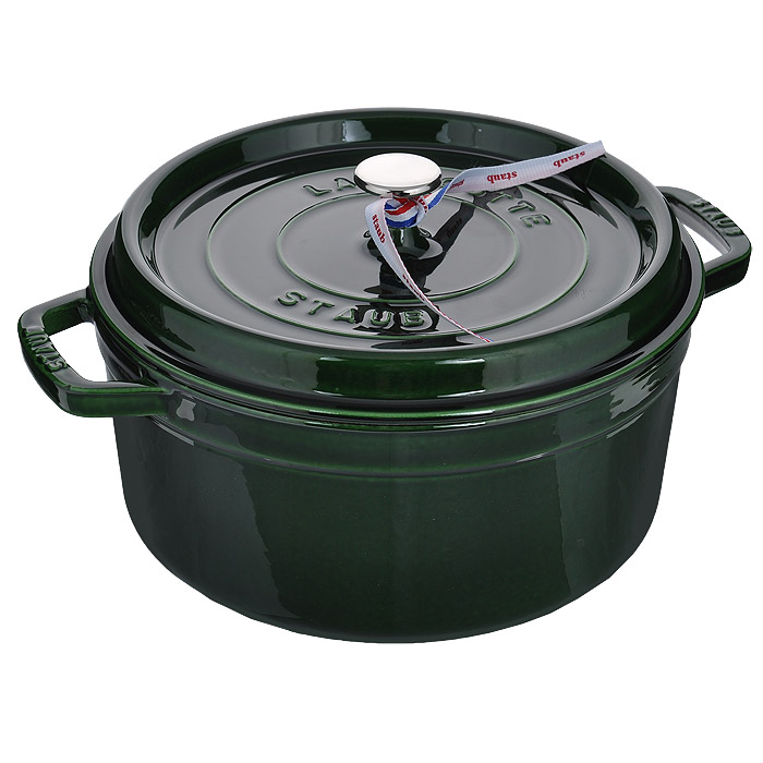 Кокот круглый Staub, цвет: базелик (зеленый), 5,2 л. 11026851102685 Кокот круглый Staub, цвет: базелик (зеленый), 5,2 л. 11026851102685Кокот Staub с крышкой изготовлен из чугуна, покрытого эмалью снаружи и внутри. Известно, что пища, приготовленная в чугунной посуде, сохраняет свои вкусовые качества, и благодаря экологической чистоте материала, не может нанести вред здоровью человека. Долговечность - еще одно преимущество чугунной посуды. Приобретая чугунную форму, вы можете быть уверены, что она прослужит вашей семье достаточно долгий срок. Подходит для использования на всех типах плит и в духовом шкафу. Перед первым использованием вымыть горячей водой, высушить на слабом огне, затем смазать растительным маслом изнутри. Погреть несколько минут на слабом огне и вытереть избыток масла. Мыть жидким моющим средством, без применения абразивных веществ и металлических губок. Можно мыть в посудомоечной машине. Характеристики:Материал: чугун. Цвет: зеленый. Объем: 5,2 л. Диаметр по верхнему краю: 26 см. Высота стенок: 12 см. Толщина стенок: 0,3 см. Толщина дна: 0,6 см.