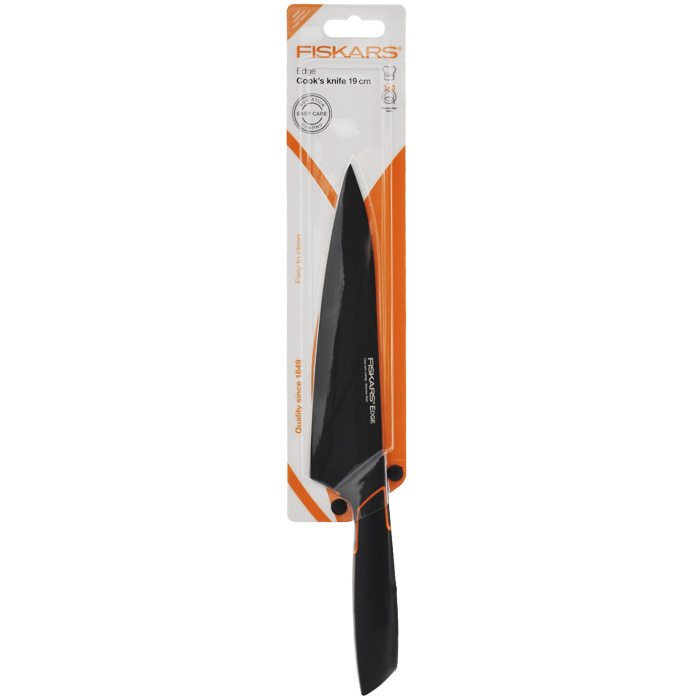 Нож кухонный Fiskars Edge, длина лезвия 19 см. 978308978308 Нож кухонный Fiskars Edge, длина лезвия 19 см. 978308978308Кухонный нож Fiskars Edge оснащен особо острым лезвием из нержавеющей стали. Легкомоющееся защитное покрытие ножа предотвращает коррозию и прилипание пищи к продуктам. Эргономичная рукоятка, выполненная из пластика черного цвета, обеспечивает надежный, безопасный захват и непревзойденный комфорт во время резки. Универсальная форма лезвия идеальна для нарезки мяса, овощей, фруктов, сыра и других продуктов. Можно мыть в посудомоечной машине. Характеристики: Материал: нержавеющая сталь, бакелит. Цвет: черный. Длина лезвия: 19 см. Длина ножа: 32,5 см.