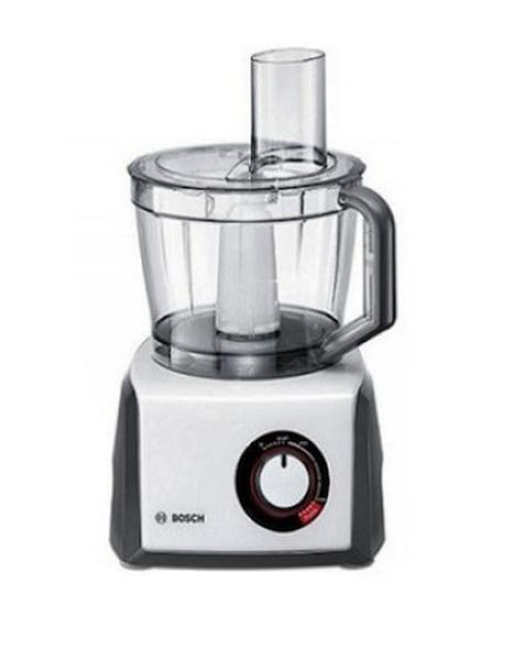 Bosch MCM 64051 Multu Talent кухонный комбайнMCM64051 Bosch MCM 64051 Multu Talent кухонный комбайнMCM64051Компактный кухонный комбайн Bosch MCM 64051 Multu Talent экономит на пространстве, но не на возможностях: компактный и многофункциональный.Более 40 функций: для шинковки, нарезки, замешивания теста, взбивания крема и др.Высокая мощность: 1200 Ватт для переработки больших объемов Большая рабочая чаша емкостью 3,9 л: возможность замеса до 1,5 кг теста Инновационный нож с волнистым краем лезвия: для качественной нарезки продуктов Плавная регулировака скорости со световым индикатором Режим Момент для измельчения зелени и импульсивный режим для взбивания коктейлей, смузи, колки льда Бесступенчатый регулятор скорости с LED индикатором работы, режимы Пульс и Момент Большая пластиковая чаша с крышкой и толкателем, объем 3,9л для 750гр муки + ингредиенты (макс. 1.5 кг) Блендер (пластик), объем 1,5 л Соковыжималка-центрифуга для твердых овощей и фруктов Нож с волнистым краем лезвия - более эффективный и более долговечный Двухсторонний диск - шинковка (крупная/мелкая), двухсторонний диск - терка (крупная/мелкая) Терка для сырых овощей из нержавеющей стали Диски из нержавеющей стали Держатель дисков Насадка для замеса теста (пластик) Венчик из нерж. стали для взбивания крема, яичных белков и легкого теста Пресс для цитрусовых Отсек для кабеля Высокая надежность посредством блокировки крышки чаши блендера Резиновые ножки-присоски
