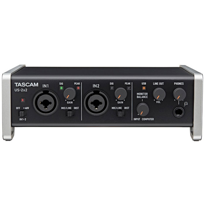 Tascam US-2x2 аудиоинтерфейсMCI52384 Tascam US-2x2 аудиоинтерфейсMCI52384Новинка от компании Tascam - двухканальный звуковой USB-интерфейс TASCAM US-2x2 – представляет собой модель начального уровня, выполненную в полностью алюминиевом корпусе в весьма аскетичном дизайне. Новинка совместима с платформами Mac и PC, а также поддерживает iOS-устройства. В комплекте с моделью TASCAM US-2x2 поставляется бесплатный софт Cakewalk Sonar X3 LE и Ableton Live Lite 9.Tascam US-2x2 поддерживает запись и воспроизведение в режимах до 24 бит 96 кГц. Он оборудован двумя микрофонными/линейными входами, которые реализованы на комбинированных разъёмах XLR/TRS. При этом для конденсаторных микрофонов предусмотрено фантомное питание +48 В, а высококачественные дискретные предусилители Ultra-HDDA обеспечивают низкий уровень искажений и шумов. С помощью переключателей на передней панели входы 1 и 2 могут быть переназначены на инструментальные, что позволит подключить к ним электрогитару напрямую.Также Tascam US-2x2 имеет MIDI вход и выход, а также балансный линейный выход 2xTRS. Усилитель для наушников имеет мощность 18 мВт на канал при нагрузке 32 Ом.На передней панели устройства имеются раздельные регуляторы уровня сигнала для обоих выходов. Питание Tascam US-2x2 получает по шине USB, также в наличии имеется гнездо для подключения фирменного адаптера переменного тока PS-P520.
