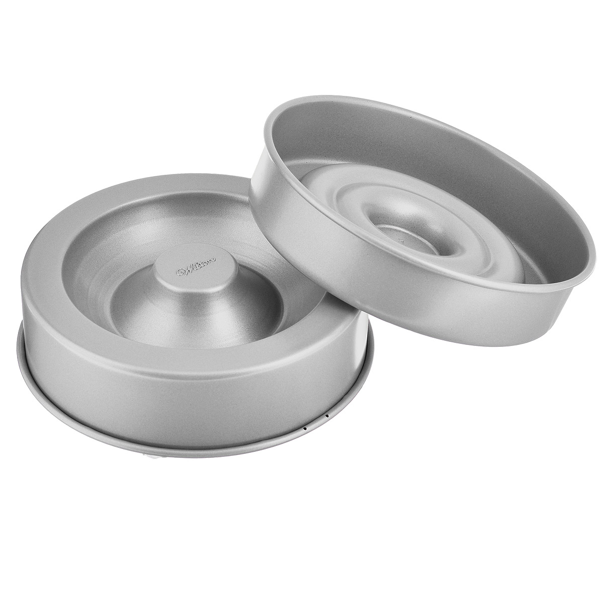 Форма для выпечки Wilton Сердце внутри, диаметр 21 см, 2 штWLT-2105-157 Форма для выпечки Wilton Сердце внутри, диаметр 21 см, 2 штWLT-2105-157Форма для выпечки Wilton Сердце внутри выполнена из высококачественного металла с антипригарным покрытием. Это уникальная форма для выпечки интересного торта. Каждый кусочек имеет вкусное сердечко! Сердцевину выпечки можно наполнить всевозможными начинками - мороженое, фрукты, муссы и др. Просто испеките, выньте из форм, наполните и уберите в морозилку.