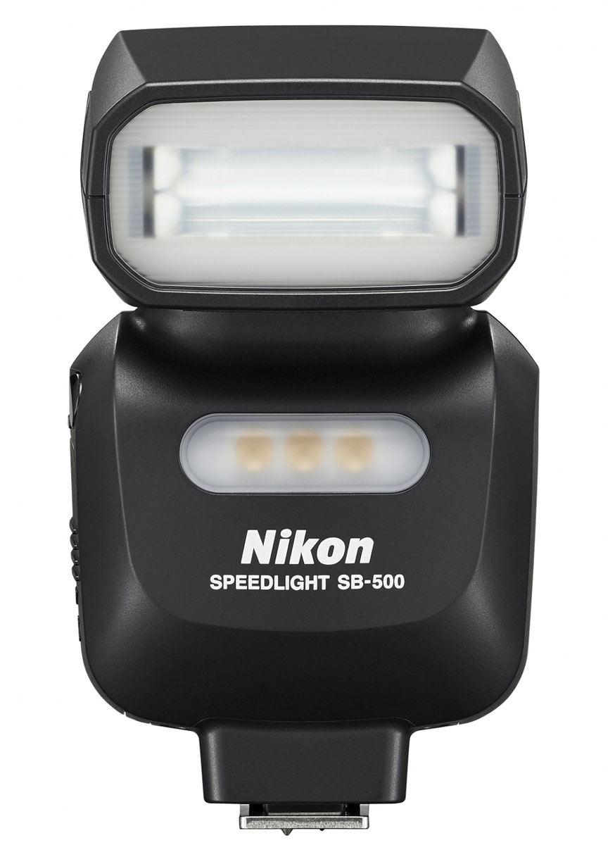 Nikon Speedlight SB-500 фотовспышкаFSA04201 Nikon Speedlight SB-500 фотовспышкаFSA04201Портативная и простая в эксплуатации вспышка Nikon Speedlight SB-500, совместимая с цифровыми зеркальными фотокамерами Nikon, некоторыми фотокамерами COOLPIX и системой креативного освещения Nikon. Встроенная светодиодная лампа высокой интенсивности идеально подходит для видеосъемки.С помощью компактной и легкой вспышки Nikon Speedlight SB-500 очень просто управлять качеством и направлением света. Компактная вспышка Speedlight i-TTL совместима с цифровыми зеркальными фотокамерами формата FX и DX, фотокамерами COOLPIX, которые оснащены горячим башмаком, и системой креативного освещения Nikon. Вспышка SB-500 может работать в качестве ведущей для нескольких вспышек, установленных не на фотокамере, если в фотокамере, на которой она установлена, предусмотрен режим управления для встроенной вспышки.Встроенная светодиодная лампа высокой интенсивности (100 лк), расположенная на передней панели вспышки, способствует идеальной съемке видеороликов. Светодиодная лампа охватывает угол зрения объектива с фокусным расстоянием 24 мм (формат FX) и обеспечивает превосходное воспроизведение цвета.Вспышка обладает отличной эргономикой в сочетании с понятными элементами управления, расположенными на задней панели. Дополнительные функции и режим вспышки можно настроить с помощью меню, которое в фотокамере включается автоматически после присоединения к ней вспышки SB-500. Головку вспышки можно поднимать под углом до 90° и поворачивать влево или вправо на 180°. Направляйте поток света под нужным углом, чтобы сделать художественные снимки или сбалансировать экспозицию при съемке в сложных условиях.