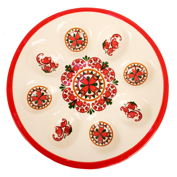 Подставка под 8 яиц Home Queen Народные промыслы, диаметр 21 см66716 Подставка под 8 яиц Home Queen Народные промыслы, диаметр 21 см66716Подставка под 8 яиц Home Queen Народные промыслы станет оригинальным украшением праздничного стола на Пасху. Изделие выполнено из высококачественной керамики, покрытой слоем сверкающей глазури, и оформлено красивым узором в традиционном русском стиле. Имеется 8 ячеек для яиц. Такая подставка красиво оформит праздничный стол и создаст особое настроение. Размер ячейки для яйца: 5,5 см х 4 см.