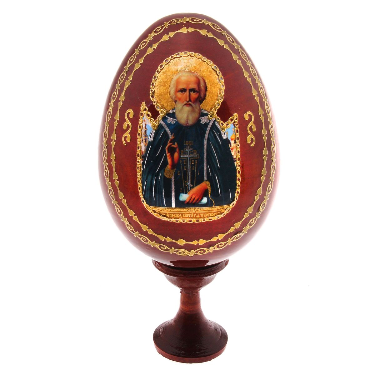 Яйцо декоративное Sima-land Сергий Радонежский, на подставке, высота 14,5 см691117 Яйцо декоративное Sima-land Сергий Радонежский, на подставке, высота 14,5 см691117Декоративное яйцо Sima-land Сергий Радонежский изготовлено из дерева с лаковым покрытием. Яйцо оформлено изображением Сергия Радонежского и золотыми узорами. Изделие располагается на деревянной подставке. Декоративное яйцо Sima-land Сергий Радонежский принесет в ваш дом ощущение торжества, душевного уюта и станет идеальным подарком на Пасху. Диаметр яйца: 7,5 см. Высота яйца: 10,5 см. Размер подставки: 3,2 см х 3,2 см х 4 см.
