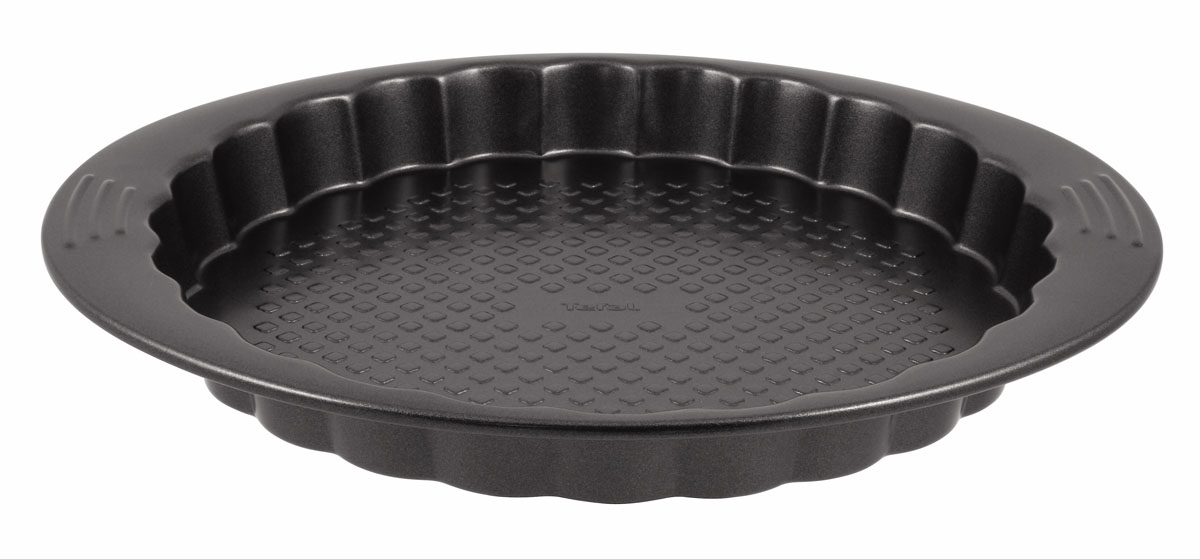 Форма для коржей Tefal EasyGrip, с антипригарным покрытием, диаметр 27 см2100069684 Форма для коржей Tefal EasyGrip, с антипригарным покрытием, диаметр 27 см2100069684Форма для коржей Tefal EasyGrip выполнена из углеродистой стали с внутренним антипригарным покрытием с рифленой поверхностью. Углеродистая сталь это прочный, легкий и долговечный материал, который прекрасно проводит тепло, помогая выпечке хорошо подходить и равномерно пропекаться, и гарантирует всегда великолепный результат. Внешнее антипригарное покрытие формы выполнено в цвете черный металлик. Слой антипригарного покрытия полностью устраняет пригорание коржа и его прилипание к стенкам и дну. Выпечка легко извлекается из противня. Экологически безопасное антипригарное покрытие не содержит PFOA, свинца и кадмия. Форма выдерживает температуру до 210°C. Изделие нельзя мыть в посудомоечной машине, нельзя использовать в микроволновой печи. Использовать только пластиковые аксессуары. С такой формой вы всегда сможете порадовать своих близких оригинальной выпечкой.Внутренний диаметр формы: 27 см.Размер формы с учетом ручек: 29,5 см х 34 см.Высота стенки формы: 3 см.
