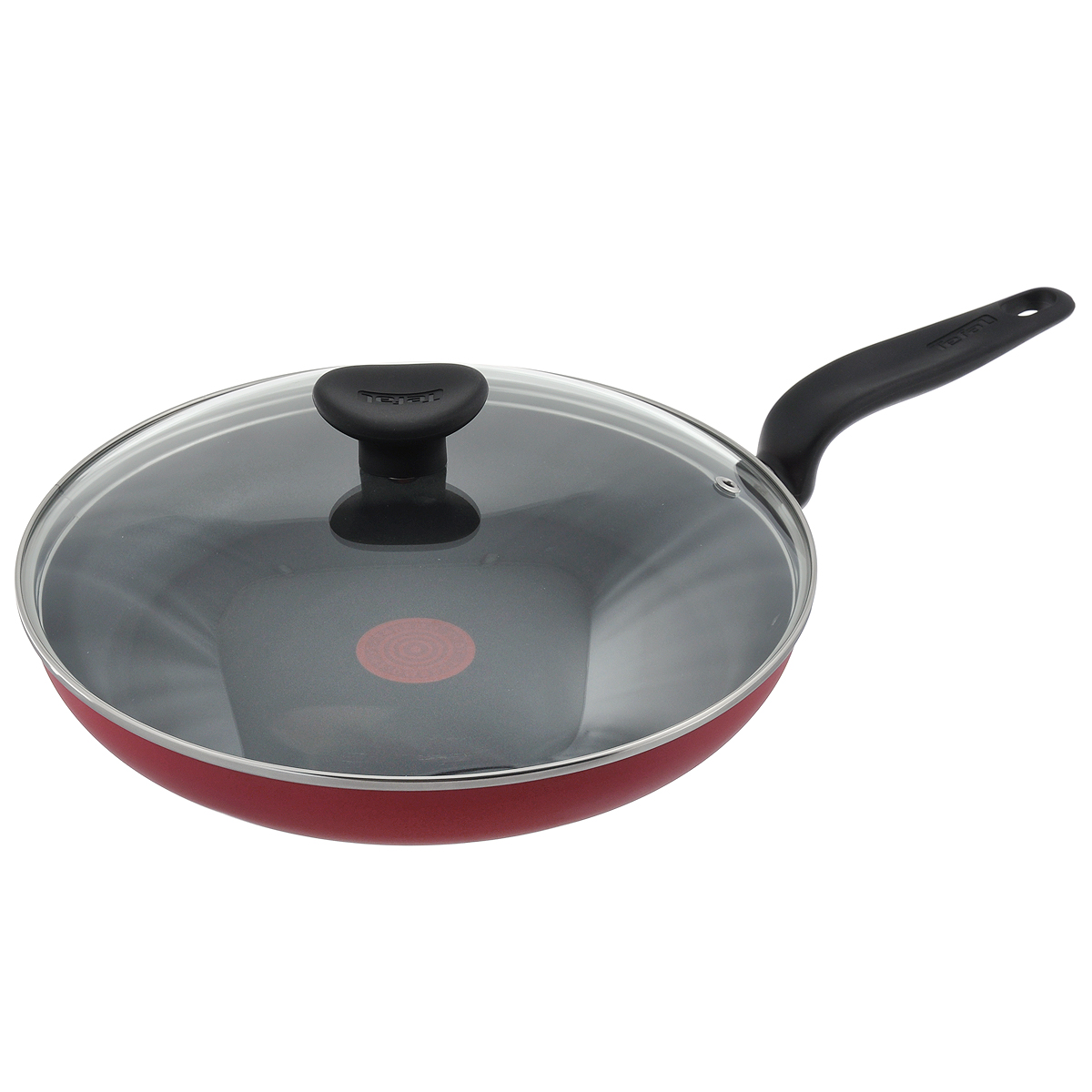 Сковорода Tefal Tulip, с крышкой, с антипригарным покрытием, цвет: красный. Диаметр 24 см9100018560 Сковорода Tefal Tulip, с крышкой, с антипригарным покрытием, цвет: красный. Диаметр 24 см9100018560Сковорода Tefal Tulip изготовлена из высококачественного алюминия с безопасным антипригарным покрытием Resist Plus. С таким покрытием пища не пригорает и посуда легко моется. Не содержит PFOA. Уникальный индикатор нагрева Thermo Spot вовремя подскажет когда дно достигло оптимальной для приготовления температуры. Благодаря прочному дну Durabase происходит идеальное и равномерное распределение тепла. Изделие снабжено удобной бакелитовой ручкой.Сковорода пригодна для газовых плит. Не подходит для индукционных плит. Можно мыть в посудомоечной машине. Диаметр (по верхнему краю): 24 см.Высота стенок: 4,5 см.Длина ручки: 17 см.Толщина стенок: 3 мм.Толщина дна: 4 мм.