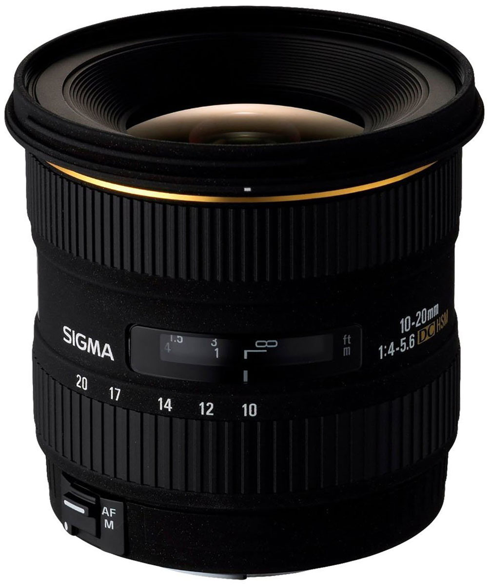 Sigma AF 10-20mm F/3.5 EX DC HSM, Black объектив для Canon202954 Sigma AF 10-20mm F/3.5 EX DC HSM, Black объектив для Canon202954Двукратный сверхширокоугольный объектив Sigma AF 10-20mm F/3.5 EX DC HSM открывает отличные возможности широкоугольной съемки как в помещении, так и на открытом воздухе. Даже с учетом кроп-фактора его диапазон фокусных расстояний охватывает наиболее употребительные широкоугольные значения 15 – 30 мм. Высокая постоянная светосила дает возможность с удобством использовать объектив в пасмурную погоду или для съемки в помещении. Угол поля зрения изменяется в пределах 102,4° - 63,8° (в зависимости от исполнения), что позволяет получать преувеличенную перспективу и с успехом решать самые сложные творческие задачи.Объектив AF 10-20 mm F/3.5 EX DC HSM специально предназначен для использования с цифровыми камерами и формирует круг изображения, в точности соответствующий площади сенсора формата APS-C. Уменьшение круга изображения позволило сделать объектив более легким и компактным, благодаря чему AF 10-20 mm F/3.5 EX DC HSM сможет с удобством отправиться со своим владельцем в любую поездку или путешествие. Объектив принадлежит к линейке профессиональной оптики Sigma EX, поэтому весьма надежен в эксплуатации и имеет очень прочную конструкцию.Оптическая схема объектива состоит из 13 линз в 10 группах. Использование трех специальных элементов (двух из стекла из стекла ELD со сверхнизким и одного из стекла SLD с низким уровнем дисперсии) позволило свести к минимуму хроматическую аберрацию. Кроме того, в конструкции предусмотрено четыре асферических линзы (две литые и две гибридные), которые эффективно исправляют дисторсию и различные виды аберраций. Оптические элементы выполнены с многослойным просветлением, что исключает появление бликов и переотражений, от которых часто страдают изображения, полученные при помощи цифровых фотокамер. Объектив обеспечивает превосходную резкость, высокий контраст и правильную цветопередачу при любом значении фокусного расстояния.Автофокусировка осуществляется при помощи ультразвукового привода HSM. Это делает процесс наведения резкости точным, быстрым и практически бесшумным. Благодаря системе внутренней фокусировки, передняя линза объектива при съемке сохраняет неподвижность, что позволяет с удобством использовать лепестковую бленду, которая предотвращает паразитную засветку кадра. При необходимости, пользователь прямо в режиме автофокуса может вручную подправить установленную автоматически резкость. Минимальная дистанция фокусировки при любом фокусном расстоянии составляет 24 см.