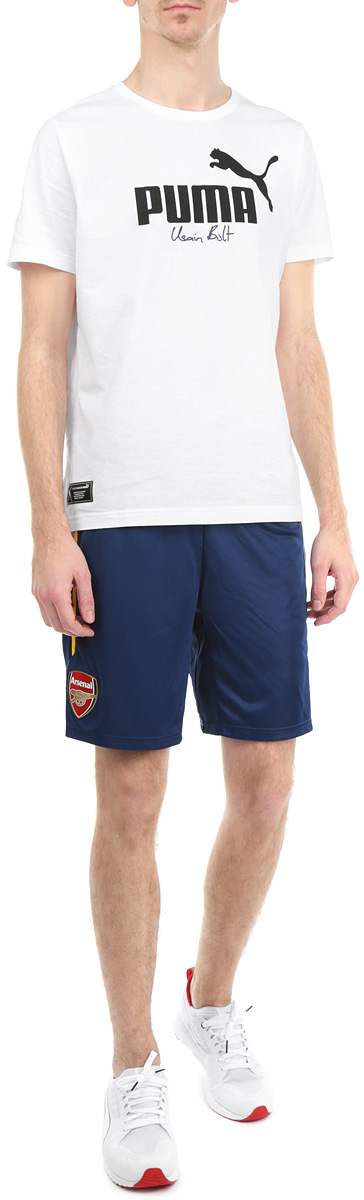 Шорты мужские Puma AFC Replica, цвет: синий. 74646103. Размер XL (50/52)74646103 Шорты мужские Puma AFC Replica, цвет: синий. 74646103. Размер XL (50/52)74646103Мужские шорты Puma AFC Replica станут отличным дополнением к вашему спортивному гардеробу. Шорты выполнены из высококачественного воздухопроницаемого материала, который великолепно отводит влагу от тела.Модель дополнена широкой эластичной резинкой на поясе и затягивается на шнурок-кулиску. Спереди изделие оформлено нашивкой с логотипом футбольного клуба Arsenal. Шорты оснащены внутренней вставкой в виде трусов-брифов. Эти модные шорты идеально подойдут для занятий спортом и бега. В них вы всегда будете чувствовать себя уверенно и комфортно.