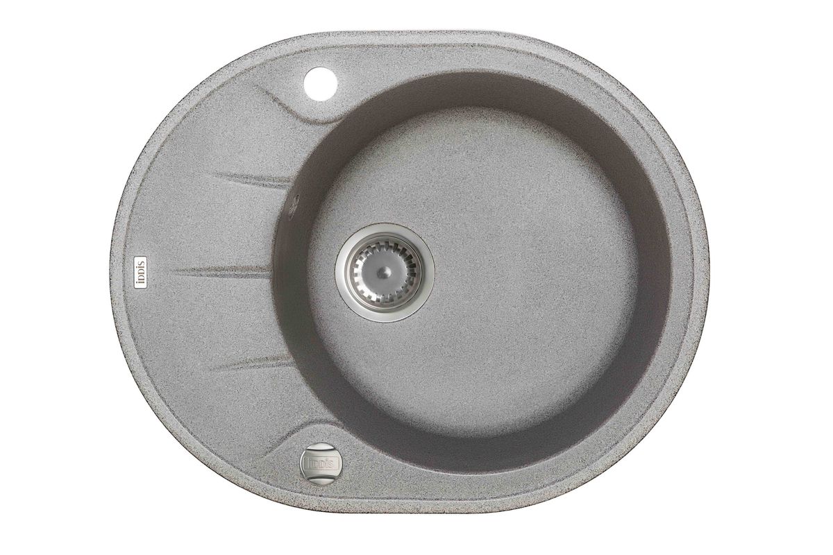 Мойка Iddis Kitchen G, Granucryl, цвет: серый, 62 х 50 см. K07G621i87K07G621i87 Мойка Iddis Kitchen G, Granucryl, цвет: серый, 62 х 50 см. K07G621i87K07G621i87Мойки для кухни Iddis производятся из особого материала Granucryl: 80% натуральной гранитной крошки производства Германии, 20% акриловой смолы. Благодаря этому, он имеет высокую устойчивость к физическим и механическим воздействиям, стойкость к воздействию средств бытовой химии и перепадам температур во время эксплуатации - свойства, необходимые для комфортного и надежного использования мойки на современной кухне.Термостойкость. Granucryl выдерживает температуру до 280С, что позволяет хозяйкам ставить на мойку даже раскаленную посуду во время приготовления пищи. Стойкость цвета. Однородность материала Granucryl и высокотемпературная пигментация гранитной крошки обеспечивает первозданную яркость цвета мойки в течение всего периода эксплуатации. Пигментация происходит во вращающихсяпечах при температуре до 600 градусов. Каждая частица гранита химически связывается с пигментом, получая свой неповторимый цвет. При этом цвет никогда не выцветает и не может быть удален с поверхности мойки.Практичность.Мелкие царапины, образующиеся при использовании, не видны на мойках IDDIS благодаря однородной структуре и пигментации гранитной крошки материала Granucryl. Гигиеничность.Состав материала Granucryl препятствует размножению бактерий на поверхности моек, что гарантирует их безопасность в условиях повышенной влажности кухни. Гигиеничность материала Granucryl подтверждена немецким институтом гигиены.Мойки Granucryl имеют полный комплект для установки: шаблон для выреза отверстия в столешнице, крепления, автоматический выпуск с переливом и плоский сифон с возможностью подключения посудомоечной или стиральной машины. Наличие готовых отверстий под смеситель и кнопку донного клапана позволяет быстро и легко установить эти изделия на мойку.Мойки Granucryl, благодаря составу материала, а также толщине 10 мм, поглощают шум воды. Гарантия на мойки Granucryl торговой марки Iddis составляет 10 лет.Мойки Granucryl торговой марки Iddis производятся согласно европейскому стандарту EN 13310:2003, что обеспечивает высокое качество продукции.Глубина чаши: 210 мм, диаметр чаши: 410 мм.
