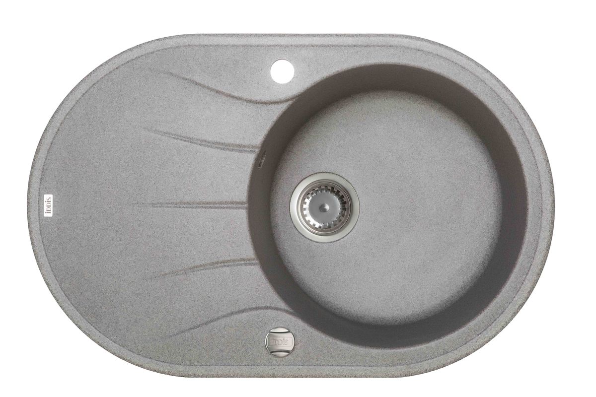 Мойка Iddis Kitchen G, Granucryl, цвет: серый, 77 х 50 см. K12G771i87K12G771i87 Мойка Iddis Kitchen G, Granucryl, цвет: серый, 77 х 50 см. K12G771i87K12G771i87Мойки для кухни Iddis производятся из особого материала Granucryl: 80% натуральной гранитной крошки производства Германии, 20% акриловой смолы. Благодаря этому, он имеет высокую устойчивость к физическим и механическим воздействиям, стойкость к воздействию средств бытовой химии и перепадам температур во время эксплуатации - свойства, необходимые для комфортного и надежного использования мойки на современной кухне.Термостойкость. Granucryl выдерживает температуру до 280С, что позволяет хозяйкам ставить на мойку даже раскаленную посуду во время приготовления пищи. Стойкость цвета. Однородность материала Granucryl и высокотемпературная пигментация гранитной крошки обеспечивает первозданную яркость цвета мойки в течение всего периода эксплуатации. Пигментация происходит во вращающихсяпечах при температуре до 600 градусов. Каждая частица гранита химически связывается с пигментом, получая свой неповторимый цвет. При этом цвет никогда не выцветает и не может быть удален с поверхности мойки.Практичность.Мелкие царапины, образующиеся при использовании, не видны на мойках IDDIS благодаря однородной структуре и пигментации гранитной крошки материала Granucryl. Гигиеничность.Состав материала Granucryl препятствует размножению бактерий на поверхности моек, что гарантирует их безопасность в условиях повышенной влажности кухни. Гигиеничность материала Granucryl подтверждена немецким институтом гигиены.Мойки Granucryl имеют полный комплект для установки: шаблон для выреза отверстия в столешнице, крепления, автоматический выпуск с переливом и плоский сифон с возможностью подключения посудомоечной или стиральной машины. Наличие готовых отверстий под смеситель и кнопку донного клапана позволяет быстро и легко установить эти изделия на мойку.Мойки Granucryl, благодаря составу материала, а также толщине 10 мм, поглощают шум воды. Гарантия на мойки Granucryl торговой марки Iddis составляет 10 лет.Мойки Granucryl торговой марки Iddis производятся согласно европейскому стандарту EN 13310:2003, что обеспечивает высокое качество продукции.Глубина чаши: 210 мм, диаметр чаши: 410 мм.