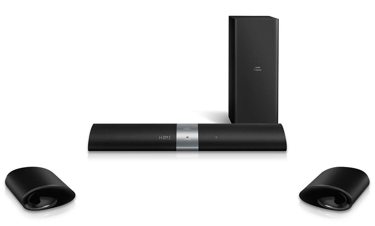 Philips Fidelio B5/12 саундбарB5/12 Philips Fidelio B5/12 саундбарB5/12Звуковая панель Philips Fidelio B5/12 создает эффект объемного звучания с помощью съемных беспроводных тыловых АС и сабвуфера. Первоклассные излучатели и пространственная калибровка гарантируют воспроизведение динамичного и сбалансированного звука. Тыловые АС можно использовать отдельно для свободного прослушивания музыки. Ощутите эффект объемного звука. Просто снимите беспроводные АС с корпуса основной системы, поместите их позади себя и наслаждайтесь объемным многоканальным звуком при просмотре фильмов или во время игр. А когда захотите послушать музыку или посмотреть телепередачи, просто установите АС на место. Благодаря уникальной беспроводной аудиотехнологии и АС объемного звучания, которые работают на собственной частоте, не возникает никаких сетевых помех. В результате вы получаете полноценную беспроводную систему объемного звучания для воспроизведения музыки и фильмов в великолепном качестве. Наша усовершенствованная функция пространственной калибровки обеспечивает сбалансированный звук, независимо от способа расположения тыловых АС в помещении. Эта функция использует специальный тональный сигнал, чтобы определить местоположение каждой тыловой АС. Полученная информация анализируется для определения и настройки оптимального звукового баланса на каждой АС. Благодаря этому слушатель наслаждается сбалансированным звучанием при любом расположении АС.Благодаря технологии Crystal Clear Sound от Philips теперь можно различить и оценить каждую ноту в исходном качестве! Технология Crystal Clear Sound воспроизводит источник звука — будь то боевик, мюзикл или живое выступление — верно, четко и без искажений. Домашние кинотеатры от Philips с Crystal Clear Sound минимально сокращают обработку звука, сохраняя четкость исходного содержимого. В результате вы слышите более точный звук.Технология NFC (Near Field Communications) позволяет выполнять подключение устройств по Bluetooth одним касанием. Поднесите смартфон или планшетный ПК с поддержкой NFC к АС и коснитесь поля NFC, чтобы включить систему. Установите Bluetooth-подключение и запустите потоковую передачу музыки.Встроенный декодер Dolby Digital устраняет необходимость иметь внешний декодер за счет обработки всех шести аудиоканалов для создания эффекта объемного звука и поразительно естественной и динамически реалистичной атмосферы звучания. Декодер Dolby Pro Logic II дает пять каналов объемной обработки звука от любого стереофонического источника.Излучатели АС центрального канала: 2 x 3, ВЧ-динамик с мягким куполом 1 — 2 штИзлучатель сабвуфера: НЧ-излучатель 6,5 — 1 штСопротивление АС центрального канала: 8 Ом