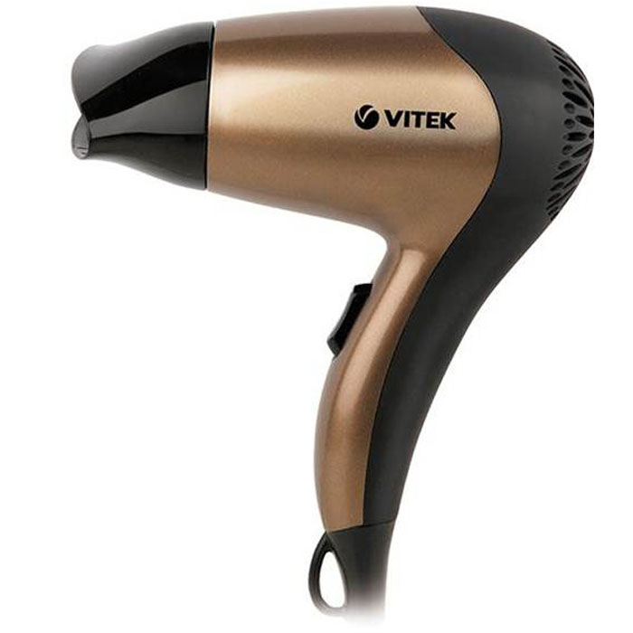 Vitek VT-2270(BN) фенVT-2270(BN) Vitek VT-2270(BN) фенVT-2270(BN)Компактный фен Vitek VT-2270(BN) обладает мощностью 1200 Вт. Он отлично подойдет в качестве дорожной модели, когда небольшие размеры устройства играют значительную роль. Данный фен оснащается насадкой-концентратором, поэтому помимо сушки волос вы с легкостью придадите им необходимый объем. Несмотря на малогабаритность, данный фен отличается надежностью. Ведь он оснащен защитой от перегрева, поэтому даже при длительном использовании фен не перегорит, а просто отключится, когда его двигатель сильно нагреется. Хранить данный фен вы можете, подвесив его на крючок за специальную петлю.