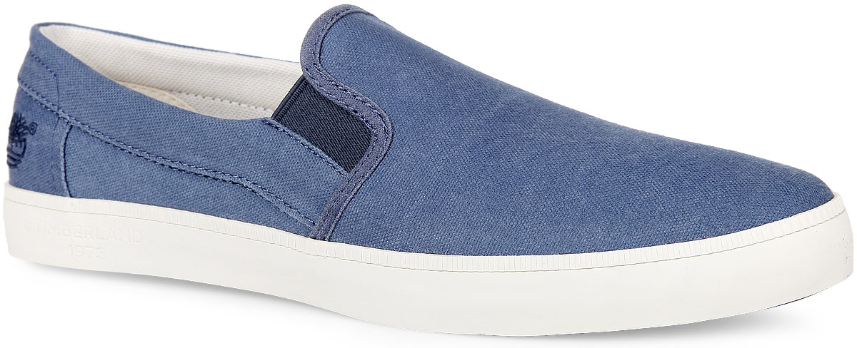 Слипоны мужские Timberland Canvas Plain Toe Slip-On, цвет: синий. TBLA16EPM. Размер 9,5 (42,5)TBLA16EPM Слипоны мужские Timberland Canvas Plain Toe Slip-On, цвет: синий. TBLA16EPM. Размер 9,5 (42,5)TBLA16EPMМодные мужские слипоны Canvas Plain Toe Slip-On от Timberland заинтересуют вас своим дизайном с первого взгляда! Модель, изготовленная из 100% хлопка, оформлена вышивкой в виде логотипа бренда. Эластичные вставки по бокам обеспечивают идеальную посадку модели на ноге. Стелька из материала EVA с текстильной поверхностью обеспечивает максимальный комфорт при движении. Рифление на подошве гарантирует идеальное сцепление с поверхностью. Стильные слипоны займут достойное место в вашем гардеробе.