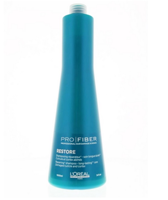 LOreal Professionnel Шампунь для сильно поврежденных волос Pro Fiber Restore Shampoo, 1000 млLE1547900 LOreal Professionnel Шампунь для сильно поврежденных волос Pro Fiber Restore Shampoo, 1000 млLE1547900LOreal Professionnel Pro Fiber Restore Shampoo - Шампунь для сильно поврежденных волос .Предназначен для ухода за волосами в домашних условиях. С его помощью волосы прекрасно очищаются, они словно оживают от деликатной, мягкой заботы.Активные компоненты:- аминосилан - силиконовое соединение кремния для связывания внутренних слоев волоса в трехмерную сеть - отвечает за укрепление и восстановление структуры.- катионный полимер, покрывающий кутикулу волоса защитной пленкой и «герметизирующий» комплекс Aptyl 100 внутри волоса.Ваши волосы вновь станут сильными, здоровыми, мягкими и шелковистыми.