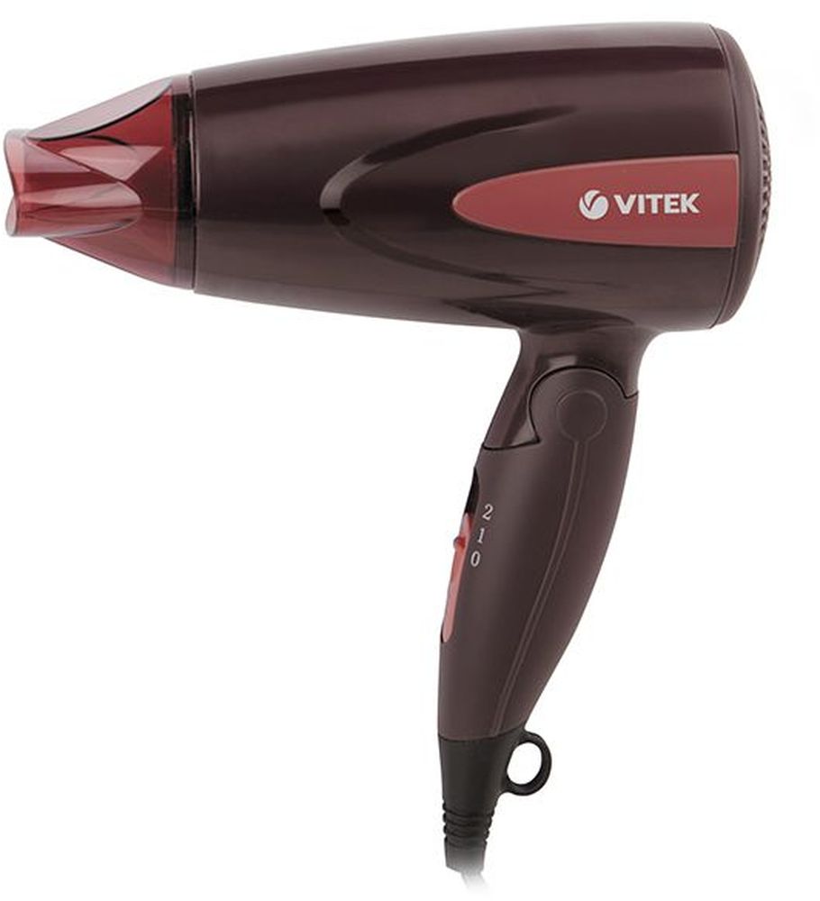 Vitek VT-2261(BN) фенVT-2261(BN Vitek VT-2261(BN) фенVT-2261(BNЛегко уложить волосы при этом сохранив их естественное здоровье вам позволит мощный, стильный и удобный фен Vitek VT-2261(BN). Данное устройство гармонично сочетает в себе приятный дизайн и оптимальный набор функций, которые позволят быстро высушить волосы и создать стильную укладку. Фен оснащен двумя скоростями работы. Концентратор позволит придать волосам объем у корней. Такой фен вы всегда можете взять с собой в путешествие, удобно уложив в чемодане благодаря складной ручке. Петелька для подвешивания позволит удобно повесить фен в ванной, экономя пространство.