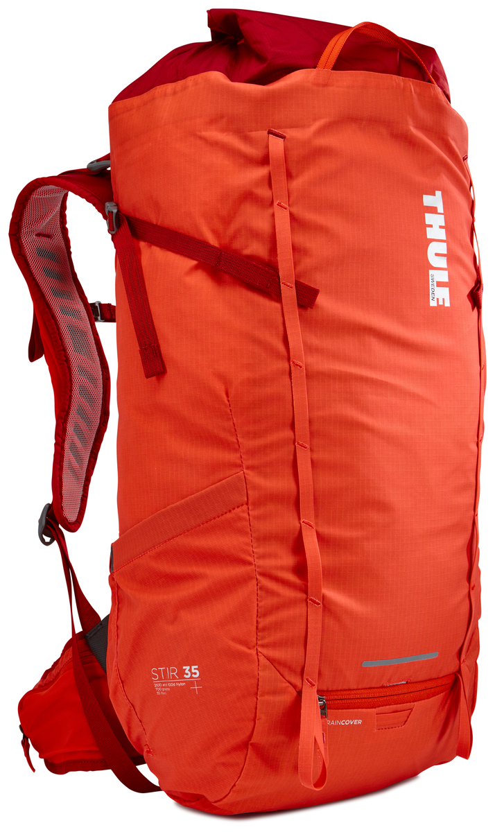 Рюкзак мужской Thule Stir 35L, цвет: оранжевый, 35 л211401 Рюкзак мужской Thule Stir 35L, цвет: оранжевый, 35 л211401Мужской рюкзак для пеших путешествий Thule Stir с объемом 35 л. Благодаря простому и элегантному дизайну в сочетании с регулировкой рюкзака по спине, множеством легкодоступных карманов и дождевым чехлом этот рюкзак идеально подходит для более долгих дневных походов. Легкодоступная крышка с защитным откидным клапаном. Система StormGuard - это комбинация частичного дождевого чехла с водонепроницаемым нижним слоем для создания полностью защищенного от непогоды рюкзака. Конструкция StormGuard обеспечивает удобный доступ к снаряжению, препятствует проникновению влаги и более надежна, чем обычный дождевой чехол. Регулировка по спине в пределах 10 см обеспечивает идеальную посадку. Съемные поясной и нагрудный ремни для городского использования. Боковая молния для удобного доступа к снаряжению. Эластичный карман на плечевом ремне для хранения телефона и других небольших предметов. Точка крепления петли для фонаря и светоотражающий материал. Передний карман Shove-it Pocket для быстрого доступа. Две петли-крепления для треккинговых палок или ледорубов.