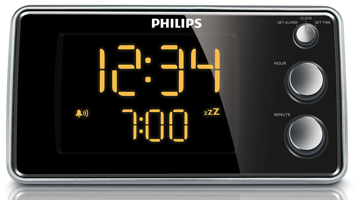 Philips AJ3551/12 радио будильникAJ3551/12 Philips AJ3551/12 радио будильникAJ3551/12Просыпайтесь под вашу любимую радиостанцию или под зуммерПросыпайтесь под свою любимую радиостанцию или ностальгический звонок будильника. Просто установите будильник на радиочасах Philips AJ3551/12 в режим включения последней прослушиваемой станции или в режим звонка. В установленное время радиочасы Philips автоматически включат эту радиостанцию или сигнал.Мягкий будильник для приятного пробужденияНачните ваш день с легкого пробуждения под постепенно нарастающую громкость будильника. Обычные сигналы будильника с предварительно установленной громкостью либо слишком тихие, чтобы разбудить вас, либо настолько громкие, что заставляют вас резко вскакивать. Просыпайтесь под вашу любимую музыку, радиостанцию или звуковой сигнал. Громкость сигнала Спокойного будильника постепенно нарастает с довольно низкой до достаточно высокой, чтобы мягко будить вас.Цифровой тюнер с предустановками для дополнительного удобстваПросто настройте необходимую станцию, а затем нажмите и удерживайте кнопку Preset (Предустановка), чтобы сохранить частоту. Благодаря функции сохранения предустановленных радиостанций можно быстро получить доступ к любимой радиостанции, не настраивая ее вручную каждый раз.Настройка яркости дисплея для удобства просмотраРегулируемая яркость дисплея позволяет настраивать дисплей в соответствии с необходимостью.Удобная установка часов и будильника без лишних инструкцийУстановка времени и будильника настолько проста, что не требует никаких инструкций и руководств. Для установки просто нажимайте кнопки на экране радиочасов Philips AJ3551/12.Большой дисплей для удобства просмотраБольшой дисплей позволяет с удобством просматривать информацию. Теперь можно без труда увидеть время или настройки будильника даже на расстоянии. Идеально подходит для людей в преклонном возрасте и людей со слабым зрением.Настраиваемый таймер выключает радиоприемник в установленное времяВремя воспроизведения радиоприемника можно с легкостью настроить, установив необходимое количество минут на цифровом таймере. Таймер выполнит обратный отсчет времени и автоматически выключит радиоприемник.