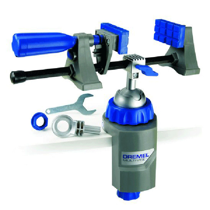 Тиски Dremel Multi-Vise 250026152500JA Тиски Dremel Multi-Vise 250026152500JAМногофункциональные тиски Dremel Multi-Vise 2500 - это инструмент 3 в 1: стационарные тиски, отдельный крепежный элемент и зажим для инструмента. Тиски крепятся на любой верстак, рабочую платформу или поверхность толщиной до 6,3 мм.Преимущества: - крепится на любой рабочий стол, платформу или облицовочный материал;- поворачивается на 360° и наклоняется на 50°. Позволяет работать с заготовкой под удобным углом;- губки можно использовать вместе с базовым блоком или отдельно как струбцину;- удобное расположение больших заготовок;- фиксирует большие предметы и защищает хрупкие детали от повреждения;- позволяет работать с круглыми деталями и заготовками неправильной формы;- позволяет быстро удалять предметы из зажима;- обеспечивает большую стабильность;- возможность присоединить фонарь DremeLite.Материал рамы: пластик. Тип тисков: поворотные. Ширина: 190 мм.