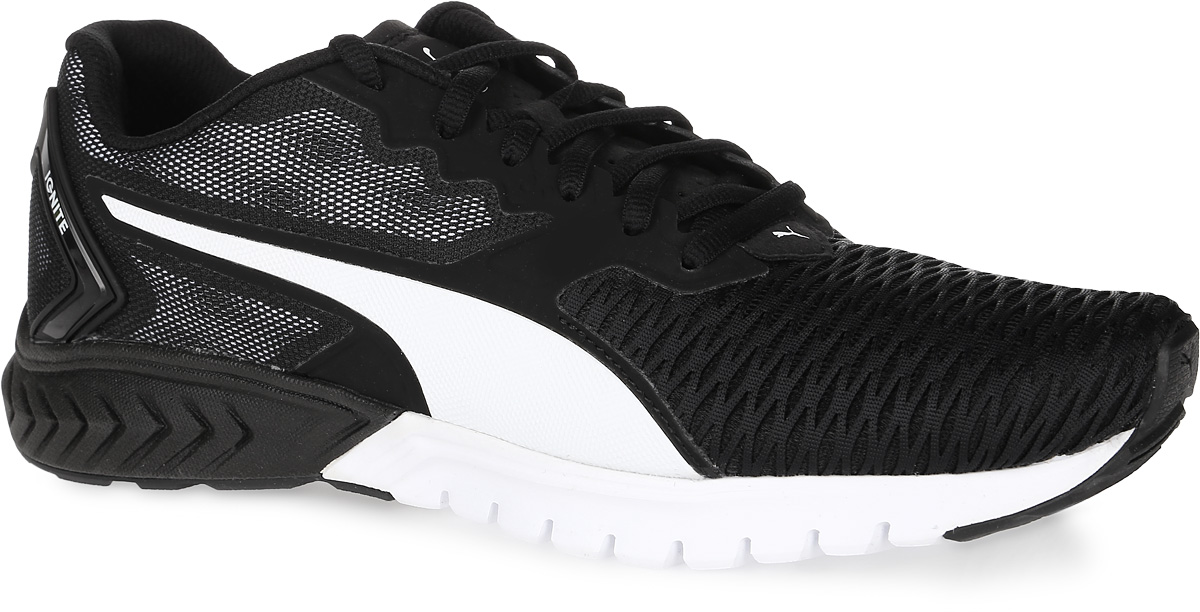 Кроссовки мужские Puma Ignite Dual, цвет: черный. 18909403. Размер 12 (46)18909403 Кроссовки мужские Puma Ignite Dual, цвет: черный. 18909403. Размер 12 (46)18909403Модель Ignite Dual от Puma, самая яркая новинка среди технологичных беговых кроссовок, обладет целым рядом особенностей, работающих на благо атлету. Верх, выполненный из эластичной текстурированной сетки, мягко облегает ногу, не препятствуя циркуляции воздуха и не сдерживая свободу движений. Формованная деталь в пяточной части обеспечивает необходимую поддержку и фиксацию стопы. Особого внимания заслуживает специально сконструированная многокомпонентная подошва, помогающая достигнуть высоких результатов как на соревнованиях, так и во время регулярных тренировок. Инновационный вспененный материал Ignite обеспечивает возврат энергии и обладает уникальными амортизирующими свойствами, необходимыми для гашения ударных нагрузок по всей поверхности. Дополнительная амортизация в пяточной части осуществляется за счет шевронного дизайна, имитирующего действие пружины, а также формованной стельки из легкого вспененного ЭВА. Расположенные в передней части подошвы бороздки Flex обеспечивают характерное для естественного бега плавное сгибание стопы от средней части к носочной. Все эти детали придают модели актуальный и оригинальный облик.
