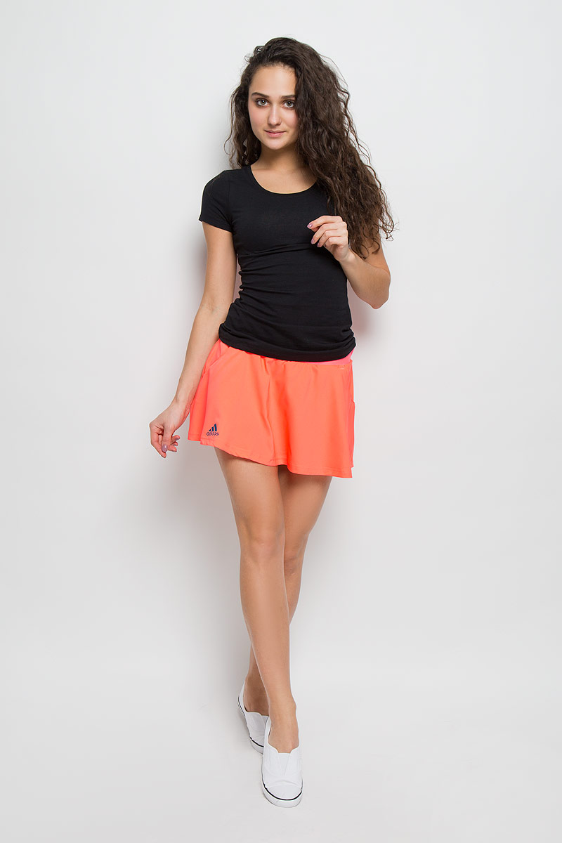Юбка adidas Club Skort, цвет: коралловый. AX8138. Размер L (48/50)AX8138 Юбка adidas Club Skort, цвет: коралловый. AX8138. Размер L (48/50)AX8138Юбка adidas Club Skort. Комфорт юбки для тех, кто ведет бескомпромиссную игру.
