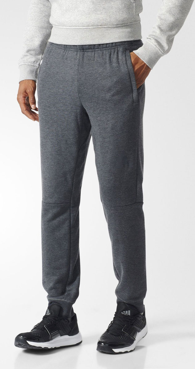 Брюки спортивные мужские adidas Workout Pant, цвет: серый. BK0945. Размер L (52/54)BK0945 Брюки спортивные мужские adidas Workout Pant, цвет: серый. BK0945. Размер L (52/54)BK0945Брюки спортивные мужские adidas Workout Pant выполнены из полиэстера и модала. Ткань с технологией climalite быстро и эффективно отводит влагу с поверхности кожи, поддерживая комфортный микроклимат. Модель дополнена передними прорезными карманами, эластичным поясом на регулируемых завязках-шнурках и эластичными манжетами.