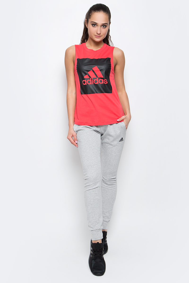 Майка женская Adidas Ess Logo Sl Tee, цвет: коралловый. S97227. Размер L (48/50)S97227 Майка женская Adidas Ess Logo Sl Tee, цвет: коралловый. S97227. Размер L (48/50)S97227Майка Ess Logo Sl Tee от adidas выполнена из натуральной хлопковой ткани, которая комфортна к телу и свободно пропускает воздух. Модель прямого кроя с круглым воротом украшена большим принтом с фирменным логотипом adidas. Внутренний шов ворота обработан тесьмой.