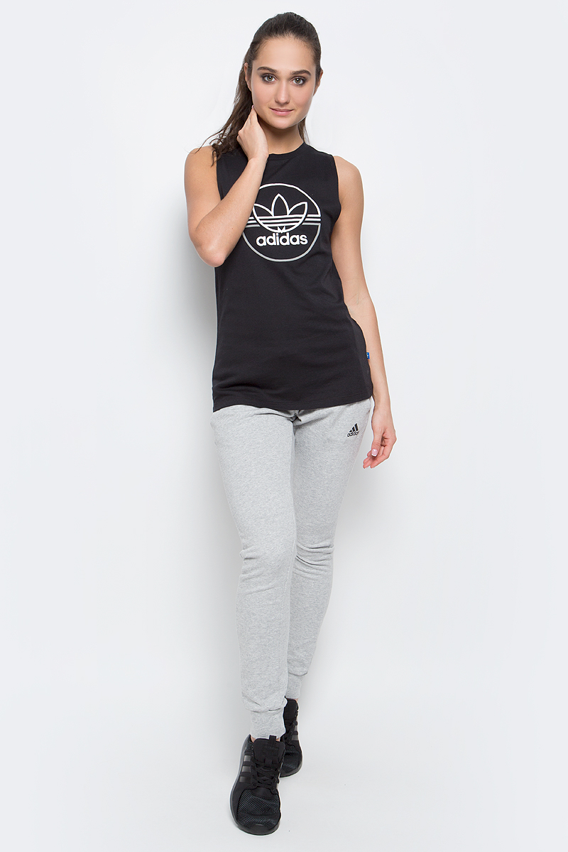 Майка женская adidas Tank Top, цвет: черный. BK2368. Размер 38 (46)BK2368 Майка женская adidas Tank Top, цвет: черный. BK2368. Размер 38 (46)BK2368Женская майка adidas Tank Top на широких бретельках с круглым вырезом горловины выполнена из натурального хлопка. Модель украшена крупным принтом с изображением логотипа бренда на груди.
