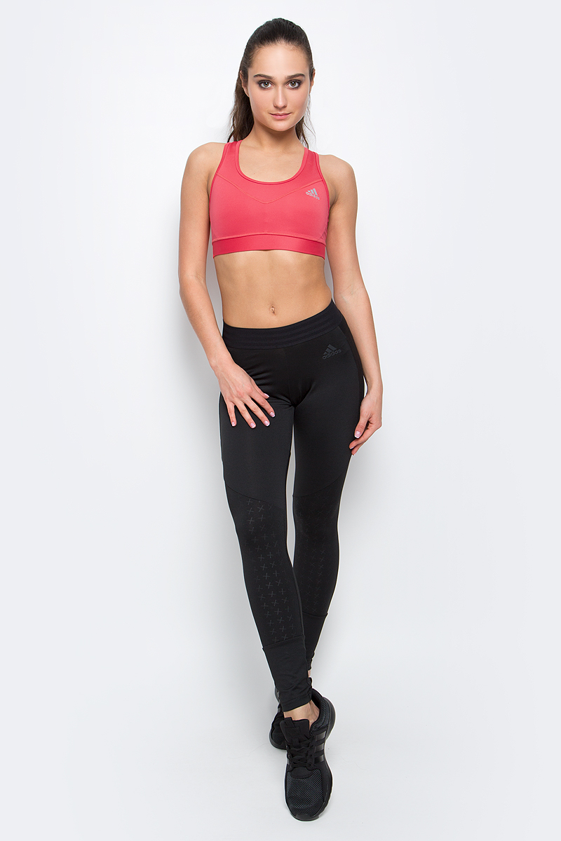 Топ-бра для фитнеса adidas Performance Tf Bra Solid, цвет: розовый. BK3529. Размер M (46/48)BK3529 Топ-бра для фитнеса adidas Performance Tf Bra Solid, цвет: розовый. BK3529. Размер M (46/48)BK3529Спортивный топ-бра adidas Performance Tf Bra Solid, выполненный из высококачественного эластичного полиэстера, обеспечивает средний уровень поддержки. Вентиляционная система Climacool отводит излишки тепла и усиливает циркуляцию воздуха. Выполнен из экологически чистых материалов. Крой с технологией Techfit фокусирует энергию мышц, обеспечивая максимальную силу отдачи, ускорение и выносливость Модель на не регулируемых по длине бретелях имеет широкий эластичный пояс, который обеспечивает бережную поддержку. Широкие бретельки и спинка-борцовка надежно фиксируют топ на плечах.