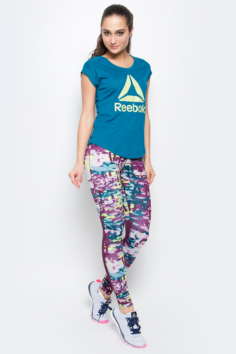 Футболка для фитнеса женская Reebok Wor Supremium 2.0 Tee Bl, цвет: синий. BK4960. Размер XS (40)BK4960 Футболка для фитнеса женская Reebok Wor Supremium 2.0 Tee Bl, цвет: синий. BK4960. Размер XS (40)BK4960Футболка с облегающим кроем Wor Supremium 2.0 Tee Bl от Reebok выполнена из полиэстера с добавлением вискозы. У модели классический ворот и стильный закругленный подол. Технология Speedwick отводит влагу с поверхности тела, оставляя ощущение сухости и комфорта.