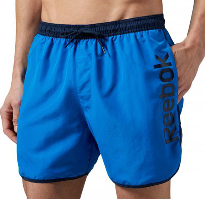 Шорты мужские Reebok Retro, цвет: синий. BK4738. Размер M (48/50)BK4738 Шорты мужские Reebok Retro, цвет: синий. BK4738. Размер M (48/50)BK4738Спортивные шорты Reebok Retro выполнены из высококачественного материала. Модель дополнена внутренним карманом и поясом на шнурке, что делает эти шорты особенно функциональными. Классический крой - шорты не слишком тесные и не слишком свободные. Отлично подходят для тренировок и повседневной носки.Мягкий трафаретный принт ручной работы, расположенный сбоку, сделает ваш образ еще более спортивным.