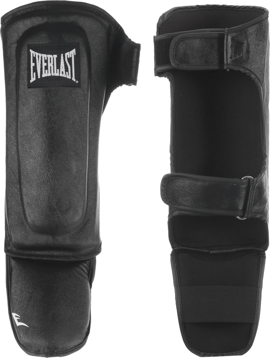 Защита голени и стопы Everlast Martial Arts Leather Shin-Instep, цвет: черный, белый. Размер S/M7750SMU Защита голени и стопы Everlast Martial Arts Leather Shin-Instep, цвет: черный, белый. Размер S/M7750SMUEverlast Martial Arts Leather Shin-Instep - это надежная защита для голени и стопы. Верх выполнен из натуральной кожи. Защита закрепляется на ноге при помощи ремней на липучках. Двойной защитный слой обеспечивает комфорт и надежную защиту от травм и ушибов. Идеально подходит для работы в спаррингах.