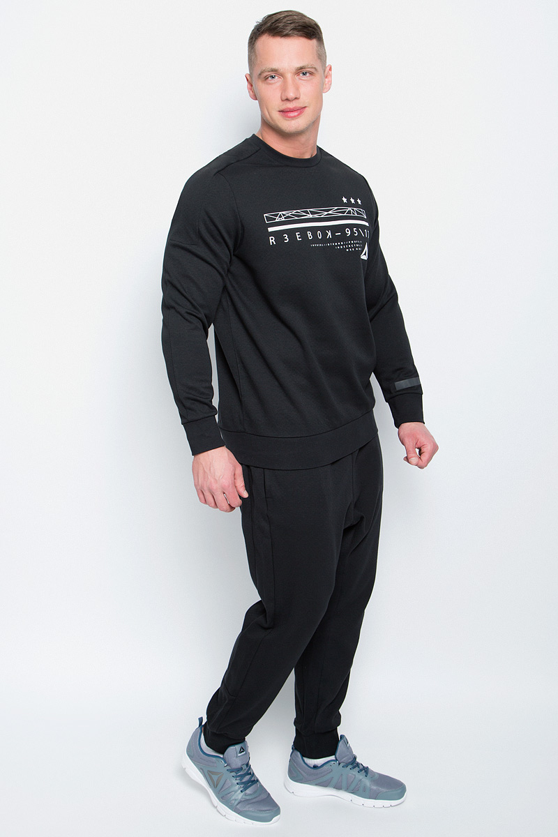 Свитшот мужской Reebok Wor C Graphic Crew, цвет: черный. BK4714. Размер M (48/50)BK4714 Свитшот мужской Reebok Wor C Graphic Crew, цвет: черный. BK4714. Размер M (48/50)BK4714Мужской свитшот Reebok Wor C Graphic Crew, выполненный из хлопка с добавлением полиэстера, идеально подойдет для повседневной носки и занятий спортом. Свитшот с круглым вырезом горловины и длинными рукавами оформлен оригинальным принтом с надписями. На рукавах предусмотрены широкие манжеты. Низ изделия дополнен трикотажной резинкой.