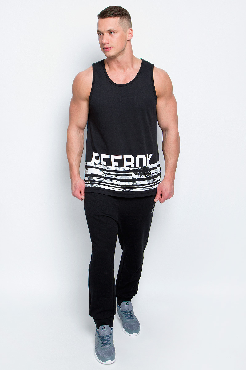 Майка мужская Reebok Wor C Tank, цвет: черный. BK4700. Размер M (48/50)BK4700 Майка мужская Reebok Wor C Tank, цвет: черный. BK4700. Размер M (48/50)BK4700Стильная мужская майка Reebok Wor C Tank изготовлена из натурального хлопка с добавлением полиэстера. Широкий круглый ворот не стесняет движений во время занятий спортом. Лицевая часть декорирована принтом с названием бренда. Текстильное полотно на спинке модели выполнено оригинальной вязкой с рисунком.