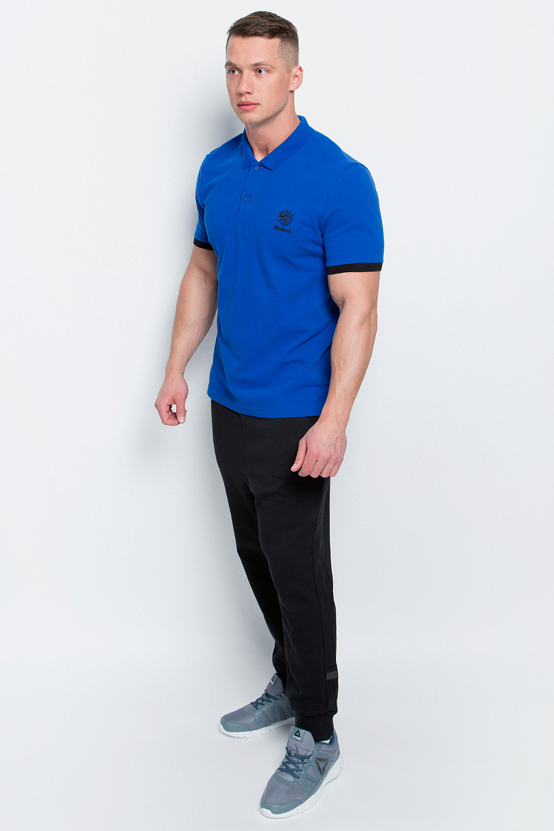 Поло мужское Reebok F Polo, цвет: темно-голубой. BK5149. Размер XL (56/58)BK5149 Поло мужское Reebok F Polo, цвет: темно-голубой. BK5149. Размер XL (56/58)BK5149Мужское поло Reebok F Polo изготовлено из натурального хлопка.Модель с короткими рукавами и отложным воротником застегивается спереди на две пуговицы. Передняя часть декорирована оригинальной вышивкой. Манжеты рукавов дополнены трикотажными резинками контрастного цвета. По бокам поло дополнено небольшими разрезами. Спинка слегка длиннее передней части поло. Стильное и современное оформление этой модели заметно подчеркнет вашу индивидуальность.