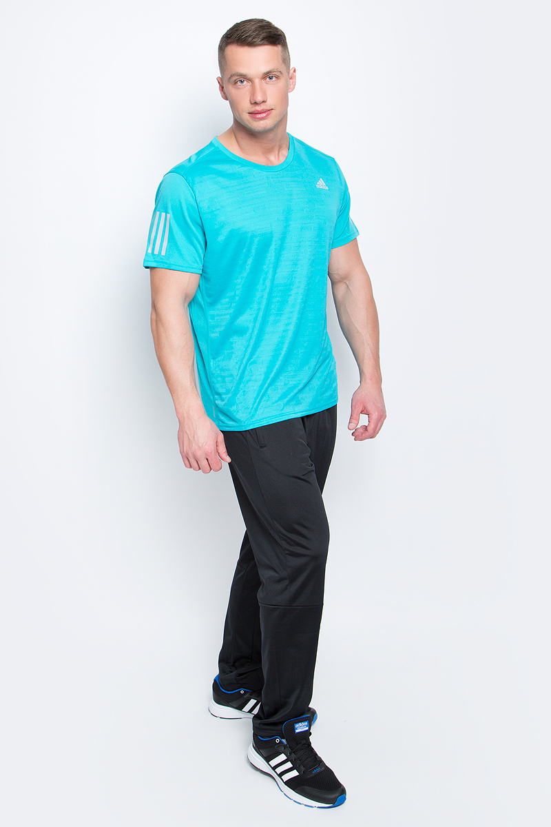 Футболка для бега мужская adidas Rs Ss Tee M, цвет: бирюзовый. BP7422. Размер M (48/50)BP7422 Футболка для бега мужская adidas Rs Ss Tee M, цвет: бирюзовый. BP7422. Размер M (48/50)BP7422Мужская спортивная футболка Adidas Rs Ss Tee M изготовлена из полиэстера с добавлением полиэфира по технологии climalite, что обеспечивает быстрое влагоотведение с поверхности тела. Модель с круглой горловиной и короткими рукавами. Однотонная футболка декорирована принтом с логотипом бренда и светоотражающими полосами на рукавах.