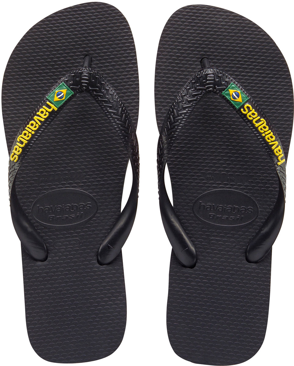 Сланцы мужские Havaianas Brasil Logo, цвет: черный. 41108500090. Размер 41/42 (42/43)4110850-0090 Сланцы мужские Havaianas Brasil Logo, цвет: черный. 41108500090. Размер 41/42 (42/43)4110850-0090Модные мужские сланцы Brasil Logo от Havaianas придутся вам по душе. Верх модели, выполненный из резины, оформлен рельефным орнаментом, названием бренда и изображением флага Бразилии. Ремешки с перемычкой гарантируют надежную фиксацию модели на ноге. Подошва выполнена из материала ЭВА и оформлена контрастными полосками. Рифление на верхней поверхности подошвы предотвращает выскальзывание ноги. Рельефное основание подошвы обеспечивает уверенное сцепление с любой поверхностью. Удобные сланцы прекрасно подойдут для похода в бассейн или на пляж.