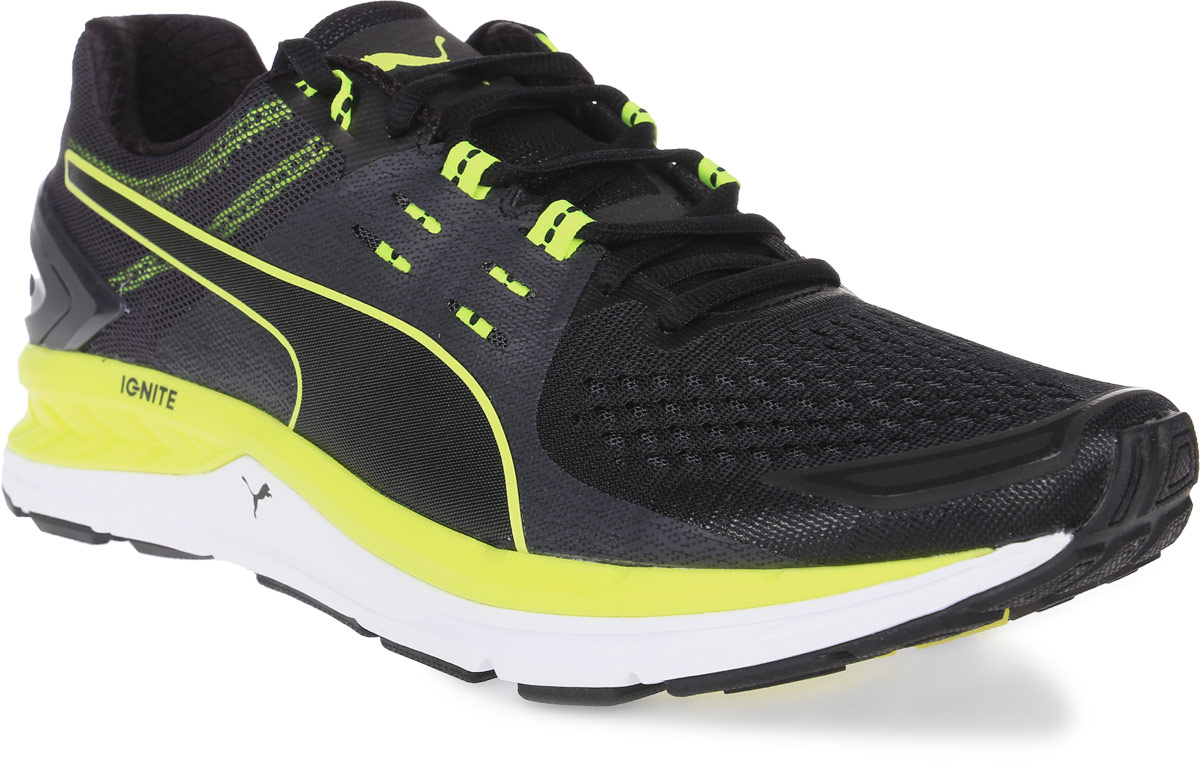 Кроссовки мужские для бега Puma Speed 1000 S Ignite, цвет: черный. 18834406. Размер 11 (45)18834406 Кроссовки мужские для бега Puma Speed 1000 S Ignite, цвет: черный. 18834406. Размер 11 (45)18834406В модели Speed1000 S Ignite достигается баланс стабильности и упругости при достаточно агрессивном, 12-ти миллиметровом переходе с пятки на носок. Для этого успешно применяется уникальный амортизирующий материал, обеспечивающий равномерное распределение ударных нагрузок при оптимальном сочетании эластичности и жесткости. Четыре технологические новинки, используемые в модели, увеличивают скорость бега её обладателя. Устойчивое положение стопы обеспечивает особая зона стабильности, создаваемая уникальной конструкцией промежуточной подошвы, препятствующей чрезмерной пронации при беге и удобно поддерживающей стопу. Возврат энергии генерирует амортизирующий материал нового поколения IGNITE в промежуточной подошве, равномерно распределяющий беговые нагрузки и обеспечивающий упругость. За продвижение вперед с ускорением отвечает особая конструкция носка, создающая необходимое сцепление с поверхностью, а также обеспечивающая эластичность и оптимальное направление вектора энергии в фазе толчка.
