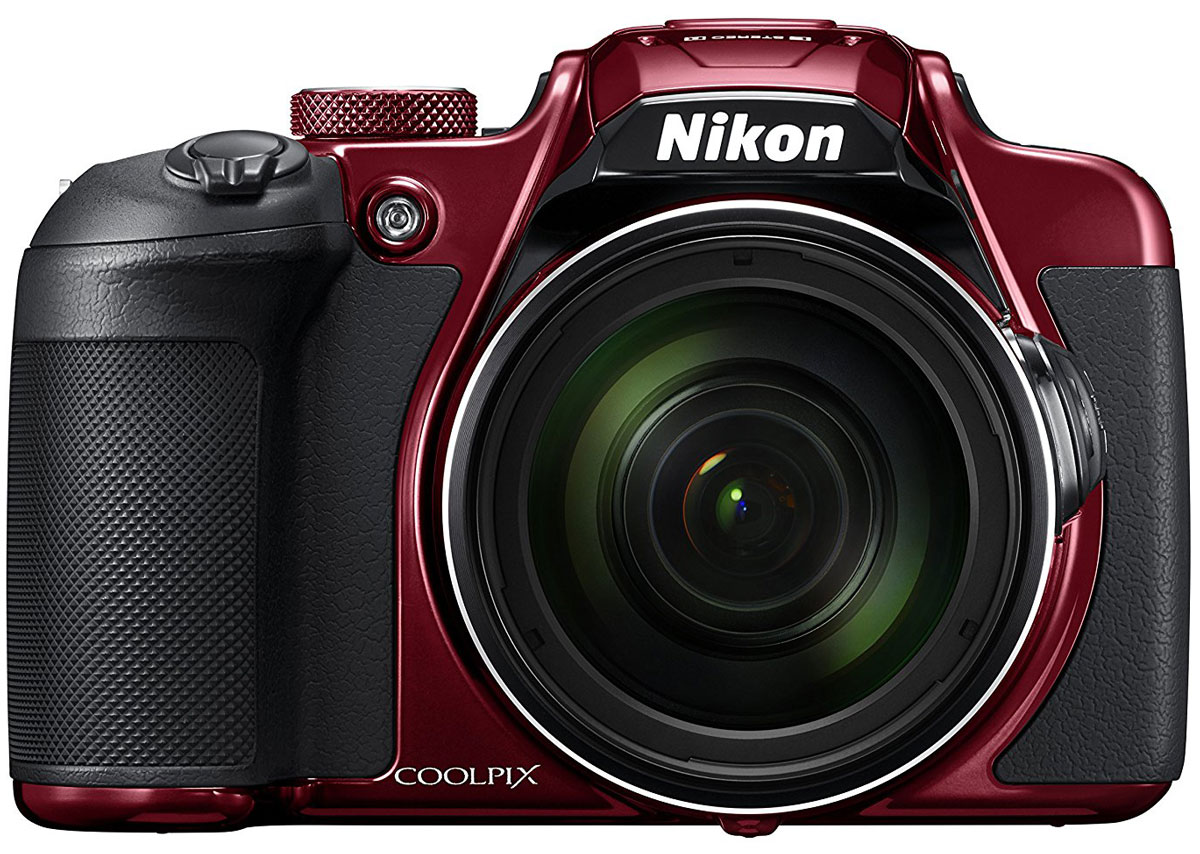 Nikon Coolpix B700, Red цифровая фотокамераVNA931E1 Nikon Coolpix B700, Red цифровая фотокамераVNA931E1Создавайте изображения с высокой детализацией с помощью 20,3-мегапиксельной фотокамеры Nikon Coolpix B700 с мощным зум-объективом.Оцените легендарное качество оптики NIKKOR в объективе с элементами из стекла ED, 60-кратным оптическим зумом, который можно увеличить до 120-кратного с помощью функции Dynamic Fine Zoom, позволяющим снимать на невероятных расстояниях, а также высокопроизводительной системой автофокусировки (АФ), обеспечивающей высокую точность съемки. Записывайте отвечающие требованиям завтрашнего дня видеоролики в формате 4K UHD и снимайте фотографии в формате RAW (NRW), обеспечивающем высочайшее качество изображений. Система Dual Detect Optical VR (подавление вибраций), позволяющая увеличить выдержку на 5 ступеней, и боковой рычажок зуммирования сводят к минимуму влияние дрожания фотокамеры. Кроме того, для съемки можно использовать электронный видоискатель или ЖК-монитор с переменным углом наклона. Поддерживайте соединение фотокамеры с интеллектуальным устройством с помощью приложения SnapBridge.Снимайте диких животных с безопасного расстояния, фотографируйте звезды в ночном небе или ловите самые впечатляющие моменты спортивных соревнований, используя объектив NIKKOR со сверхмощным 60-кратным оптическим зумом, который можно расширить до 120-кратного с помощью функции Dynamic Fine Zoom. Диапазон зуммирования охватывает углы зрения от широкоугольного 24 мм до супертелефото 1440 мм (эквивалент для формата 35 мм), а также поддерживает макросъемку объектов, расположенных на расстоянии всего 1 см от объектива. Залогом превосходных результатов является надежная оптика NIKKOR с использованием стекла Super ED. Конструкция объектива с элементом из стекла Super ED обладает улучшенными характеристиками, в том числе чрезвычайно высокой способностью к устранению вторичного спектра, что обеспечивает превосходную коррекцию хроматической аберрации.Высокое разрешение КМОП-матрицы фотокамеры позволяет создавать изображения с большей детализацией, а сверхчувствительная высокоскоростная система АФ быстро распознает объект, поэтому вы никогда не упустите решающий момент. АФ с обнаружением объекта обеспечивает более гибкую компоновку кадра, поскольку оптимальный размер зоны фокусировки и положение выбираются в зависимости от объекта съемки. Если фотокамеру навести на объект, она мгновенно определяет область, в которой следует фокусироваться. Активная зона фокусировки устанавливается автоматически по отношению к размеру объекта, обеспечивая отличную резкость любых изображений. Функция АФ с обнаружением объекта эффективна для объектов, находящихся как в центре, так и в других частях кадра, и хорошо работает и при съемке людей, и в случае небольших объектов, таких как цветы и еда.Снимайте безупречно плавные видеоролики 4K со сверхвысоким разрешением (3840x2160/30p) - это гарантирует, что ваши записи будут соответствовать требованиям завтрашнего дня, так как разрешение 4K UHD становится стандартным, - и великолепным качеством звука благодаря функции изменения диапазона микрофона, которая регулирует направленность микрофона в соответствии с настройками зума. Запись видео можно начать в любой момент с помощью специальной кнопки видеосъемки. Благодаря поддержке HDMI фотокамеру можно с помощью дополнительного кабеля HDMI подключить к телевизору или другому внешнему монитору.Электронный видоискатель с ЖК-экраном (с диоптрийной настройкой) с диагональю 0,2 дюйма и высоким разрешением (921 тыс. точек) обеспечивает стопроцентное покрытие кадра, поэтому вы всегда будете четко видеть объект съемки. Датчик видоискателя автоматически переключает изображение с монитора на электронный видоискатель, когда фотограф приближает к нему лицо, что дает возможность с легкостью менять стиль съемки, используя попеременно экран и видоискатель. Съемка с помощью видоискателя удобна в условиях ограниченного пространства, она также обеспечивает устойчивое положение, сводя к минимуму дрожание фотокамеры.Большой экран с переменным углом наклона обеспечивает чрезвычайную гибкость выбора точек съемки: можно снимать с высокой точки, подняв фотокамеру над толпой на концертах, использовать низкую точку при съемке дикой природы или фотографировать достопримечательности в путешествиях в совершенно необычных ракурсах. Благодаря монитору с переменным углом наклона фотограф может без труда запечатлеть самого себя - например, чтобы добавить собственные комментарии во время видеосъемки или на ходу снять автопортрет, находясь в необычном месте. Совмещение по технологии RGBW обеспечивает превосходную видимость даже при ярком солнечном свете, а также низкое энергопотребление.Система подавления вибраций снижает влияние дрожания фотокамеры, позволяя получать резкие изображения с оптимальной экспозицией в любых условиях съемки. Использование системы Dual Detect Optical VR, позволяющей увеличить выдержку на 5 ступеней, обеспечивает эффект коррекции, эквивалентный использованию выдержки, меньшей на 5 ступеней. Это позволяет устранить необходимость в более коротких выдержках и избежать таких ошибок, как неправильная экспозиция или чрезмерно завышенная чувствительность. Новый алгоритм VR, использующий информацию о дрожании фотокамеры, полученную датчиком угловой скорости, вместе с данными о направлении и величине дрожания (информация о векторе движения), точнее определяет уровень смазывания изображения и более эффективно подавляет вибрации.Приложение SnapBridge поддерживает постоянное соединение малой мощности между фотокамерой и смартфоном или планшетом, позволяя с легкостью управлять различными этапами съемки и работы с изображениями. Теперь вы можете мгновенно передавать снимки на интеллектуальное устройство с помощью синхронизации и сразу же обмениваться высококачественными снимками. Кроме того, вы можете управлять основными функциями фотокамеры с помощью мобильного телефона, автоматически устанавливать правильную дату и время и выполнять другие действия.В ситуациях, когда для съемки уникального кадра может не быть второго шанса, вы можете положиться на быструю реакцию фотокамеры B700. Благодаря быстрому включению (приблизительно 1,3 с), высокоскоростной АФ, обеспечивающей четкую фокусировку примерно за 0,09 с, и малой задержке срабатывания затвора вы сможете запечатлеть действие, не теряя ни секунды. Вы никогда не упустите решающий момент.Съемка в формате RAW (NRW - собственный формат Nikon) позволяет не беспокоиться о возможной потере качества изображений. При записи изображений в формате NRW на карту памяти информация о коррекции экспозиции, балансе белого, оттенке, тональности и повышении резкости сохраняется в файле в виде набора инструкций. Этот набор инструкций можно менять столько раз, сколько потребуется, не затрагивая исходные данные RAW.