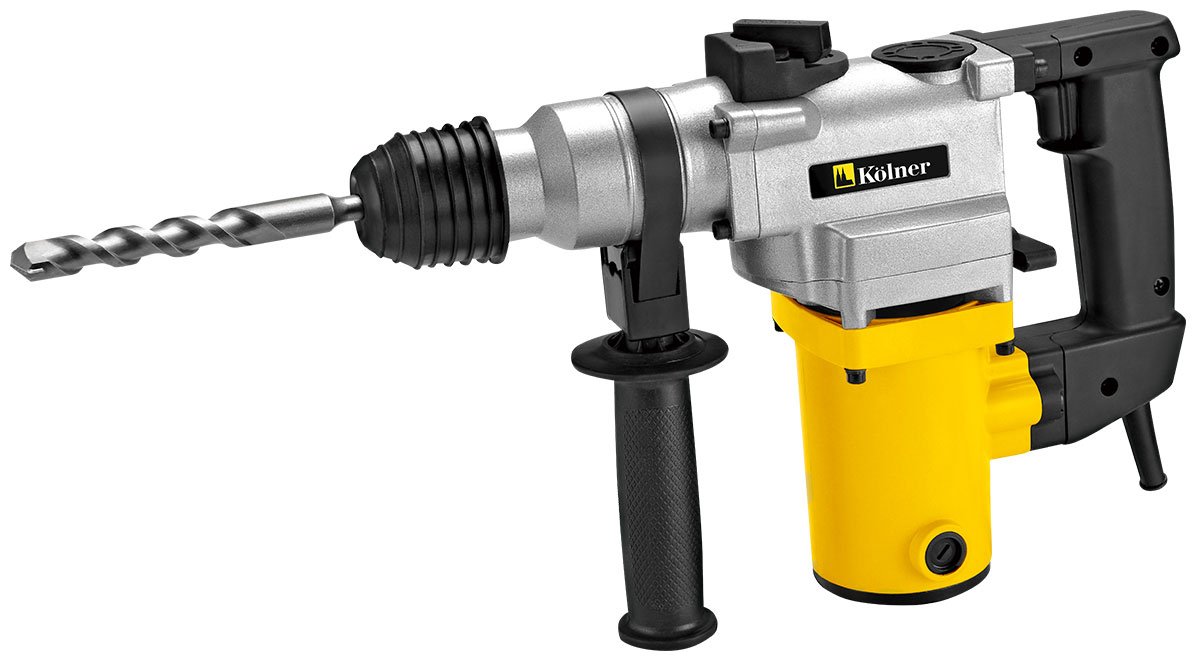 Перфоратор Kolner KRH 900Cкн900ц Перфоратор Kolner KRH 900Cкн900цПерфоратор Kolner KRH 900C оснащен вертикальным двигателем и имеет медные обмотки ротора и статора. Он предназначен для проведения демонтажных работ на строительных объектах.Высокая производительность достигается за счет вертикального расположения мощного электромотора, а также медных обмоток ротора и статора.Предохранительная муфта служит для прекращения вращения патрона при заклинивании бура, что предотвращает поломку инструмента и защищает оператора.Благодаря патрону SDS-plus можно легко и быстро сменить насадки. Имеется прямой доступ к щеточному узлу, что позволяет легко заменить угольные щетки, не разбирая корпус инструмента.Дополнительная рукоятка способствует комфортной работе пользователя. Модель имеет три режима работы: сверление, ударное сверление, долбление.