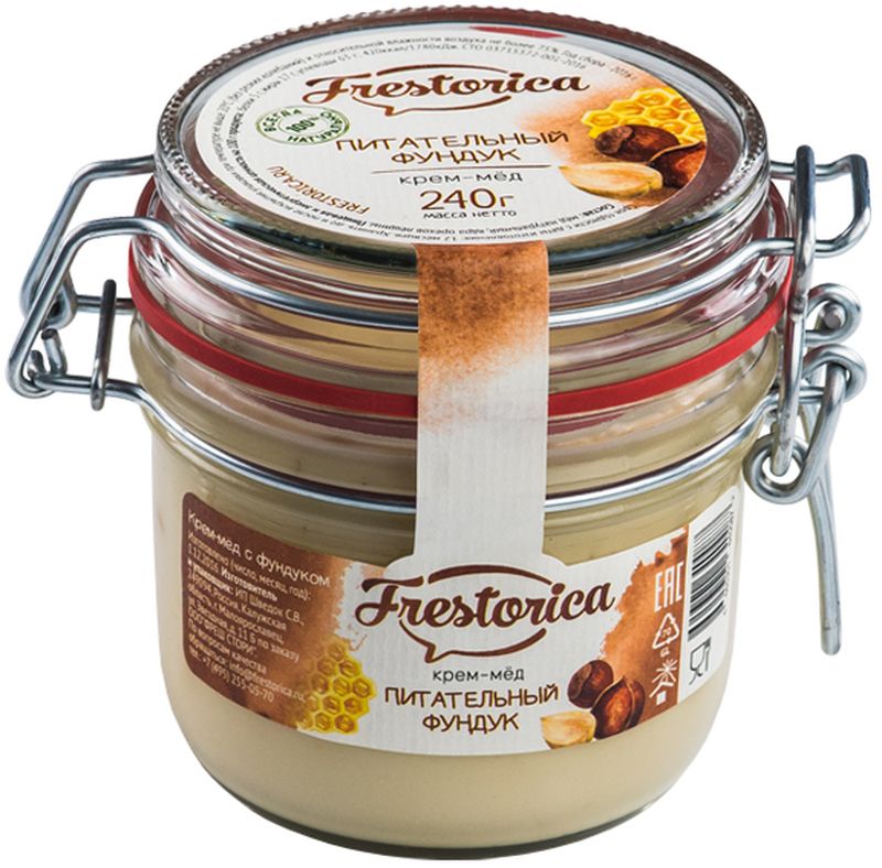 Frestorica крем-мед Питательный фундук, 240 г4665301640087 Frestorica крем-мед Питательный фундук, 240 г4665301640087Лесные орехи или фундук – один из самых сытных продуктов питания. По содержанию белка они не уступают мясным продуктам. Фундук содержит ненасыщенные жирные кислоты полезные для сердца, а также витамины группы В, полезные для нервной системы. Соединение орехов и меда позволяет создать питательный продукт, который удовлетворяет сразу трем критериям здорового питания: высокое содержание питательных веществ; наличие витаминов и микроэлементов и замечательный вкус, который нравится всем.