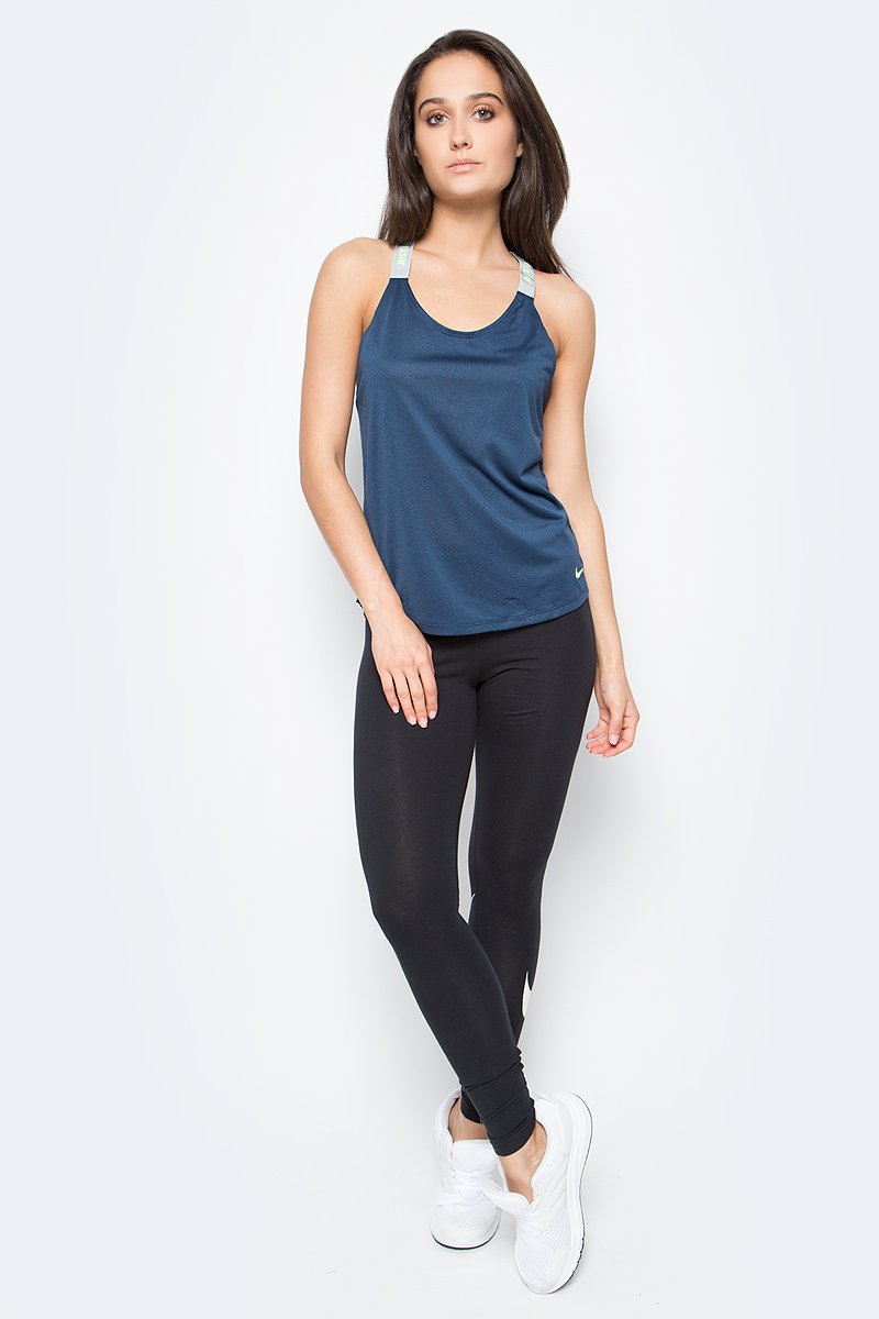 Майка для фитнеса женская Nike Dry Training Tank, цвет: темно-синий. 831312-464. Размер L (46/48)831312-464 Майка для фитнеса женская Nike Dry Training Tank, цвет: темно-синий. 831312-464. Размер L (46/48)831312-464Майка для фитнеса Dry Training Tank от Nike выполнена из влагоотводящей ткани с технологией Dri-FIT, которая отводит от кожи влагу, обеспечивая комфорт. Свободный крой, Т-образная спина и эластичные бретели обеспечивают свободу движений.