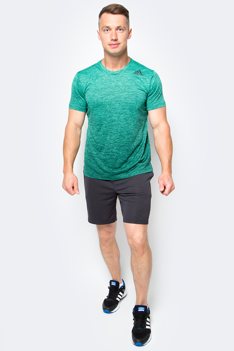 Футболка мужская adidas Freelift Grad, цвет: зеленый. BK6141. Размер M (48/50)BK6141 Футболка мужская adidas Freelift Grad, цвет: зеленый. BK6141. Размер M (48/50)BK6141Мужская футболка adidas Freelift Grad выполнена из 100% полиэстера. Ткань с технологией climalite быстро и эффективно отводит влагу с поверхности кожи, поддерживая комфортный микроклимат. Особый крой и строение швов FreeLift обеспечивают поддерживающую посадку для полной свободы движений и не дают модели задираться.