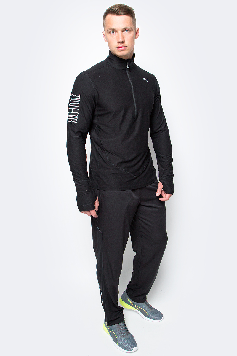 Лонгслив мужской Puma Nightcat 1 2 Zip Top, цвет: черный. 51436801. Размер XXL (52/54)514368_01 Лонгслив мужской Puma Nightcat 1 2 Zip Top, цвет: черный. 51436801. Размер XXL (52/54)514368_01Лонгслив изготовлен с использованием высокофункциональной технологии warmCell, которая благодаря дышащим свойствам материала удерживает тепло и сохраняет оптимальную температуру вашего тела даже в холодную погоду. Спереди нанесен крупный броский набивной рисунок из светоотражающего материала актуальной в сезоне тематики. Также она декорирована спереди и сзади логотипом и другими элементами из светоотражающего материала, благодаря чему вас хорошо видно с любого ракурса в темное время суток. Вставки из сетчатого материала создают дополнительную вентиляцию и помогают избежать перегрева. В кармане на молнии ваши вещи будут в целости и сохранности. Петля для наушников на изнанке позволяет регулировать длину их провода. Длинные манжеты, надежно защищающие от холода кисти рук, снабжены прорезями для большого пальца.