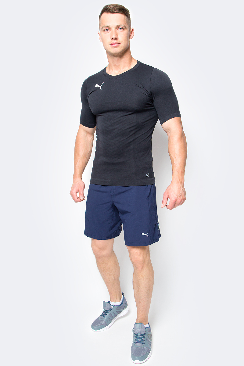 Футболка мужская Puma ftblTRG evoKNIT Tee, цвет: черный. 655205_03. Размер L (48/50)655205_03 Футболка мужская Puma ftblTRG evoKNIT Tee, цвет: черный. 655205_03. Размер L (48/50)655205_03Футболка ftblTRG evoKNIT Tee изготовлена из 100% полиамида с верхним покрытием из биоматериала. Бесшовная конструкция изделия по корпусу из трикотажа жаккардового плетения создает максимальный комфорт. Изделие имеет классический крой, круглый вырез горловины и стандартные короткие рукава. Модель дополнена набивным логотипом PUMA с правой стороны груди. Такая футболка прекрасно подходит для тренировок.