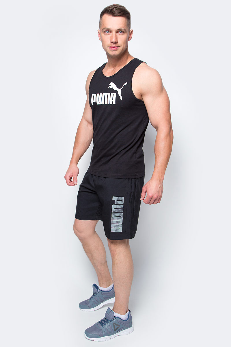 Шорты мужские Puma Hero Woven Shorts, цвет: черный. 83832731. Размер S (44/46)83832731 Шорты мужские Puma Hero Woven Shorts, цвет: черный. 83832731. Размер S (44/46)83832731Шорты мужские Hero Woven Shorts выполнены из 100% полиэстера с биопропиткой, которая позволяет выводить влагу наружу, сохранять сухость и комфорт даже при интенсивных нагрузках. Шорты декорированы логотипом PUMA на левой штанине. Среди других особенностей изделия - эластичный пояс с затягивающимся шнуром, боковые карманы в швах, нашитая сверху задняя кокетка для лучшей посадки по фигуре, светоотражающие элементы. Удобные свободные шорты отлично подойдут для занятий спортом и повседневной носки.