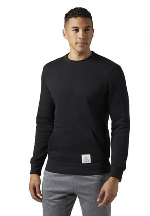 Свитшот мужской Reebok Cs Crew Sweat, цвет: черный. BP8473. Размер L (52/54)BP8473 Свитшот мужской Reebok Cs Crew Sweat, цвет: черный. BP8473. Размер L (52/54)BP8473Мужской свитшот Reebok выполнен из хлопка с добавлением полиэстера. Модель с круглым вырезом горловины и длинными стандартными рукавами. Манжеты, горловина и подол оформлены трикотажной резинкой. Свободный крой не сковывает движения, а теплый флис создает ощущение уюта. Графические элементы спереди и сзади завершают модный дизайн. Свитшот дополнен карманом кенгуру с логотипом бренда.