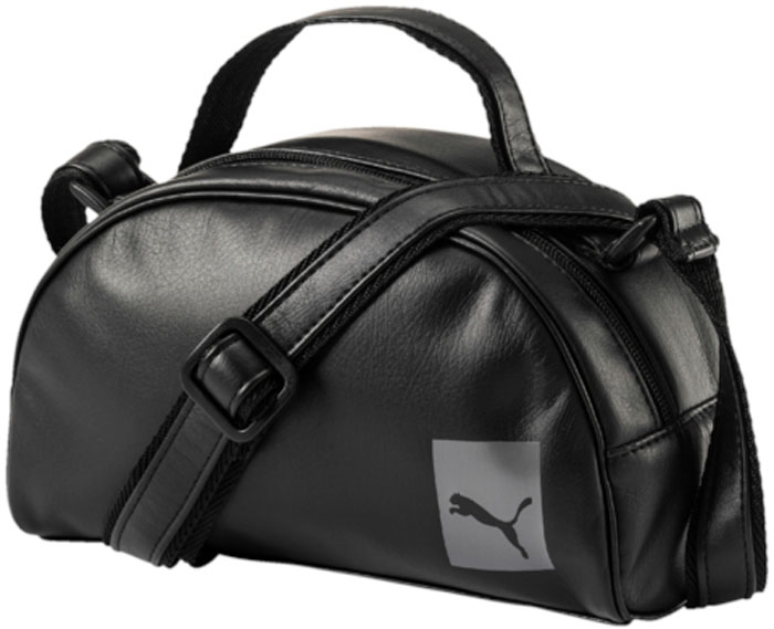 Сумка женская Puma Prime Mini Grip P, цвет: черный, 3 л. 0747540107475401 Сумка женская Puma Prime Mini Grip P, цвет: черный, 3 л. 0747540107475401Сумка имеет главное отделение на молнии, функциональную подкладку из полиэстера с изнанкой из полиуретана, короткую ручку для переноски сверху из лямочной ленты с полиуретановой подложкой, а также лямку через плечо из плотной тесьмы регулируемой длины с полиуретановой подложкой и пластиковой фурнитурой. Символика Puma представлена тисненой надписью Puma на язычках застежек-молний. Также сумка декорирована тканым ярлыком с логотипом винтажной коллекции Puma, либо набивной эмблемой с логотипом Puma спереди, в зависимости от цветового варианта.