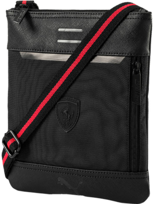 Сумка на плечо Puma Ferrari Ls Flat Portable, цвет: черный, 1,5 л. 0748420107484201 Сумка на плечо Puma Ferrari Ls Flat Portable, цвет: черный, 1,5 л. 0748420107484201Сумка имеет главное отделение на молнии, вертикальный карман на молнии спереди, два отделения и накладной карман с подкладкой внутри, функциональную подкладку из полиэстера с изнанкой из полиуретана и лямку через плечо из плотной тесьмы регулируемой длины с металлической фурнитурой. Символика PUMA и Ferrari широко представлена в виде тисненых логотипов гоночной команды Ferrari и PUMA на металлических язычках застежек-молний, тиснёной эмблемой гоночной команды Ferrari на задней панели, силиконовой эмблемы Ferrari спереди и тисненого логотипа Puma спереди внизу.
